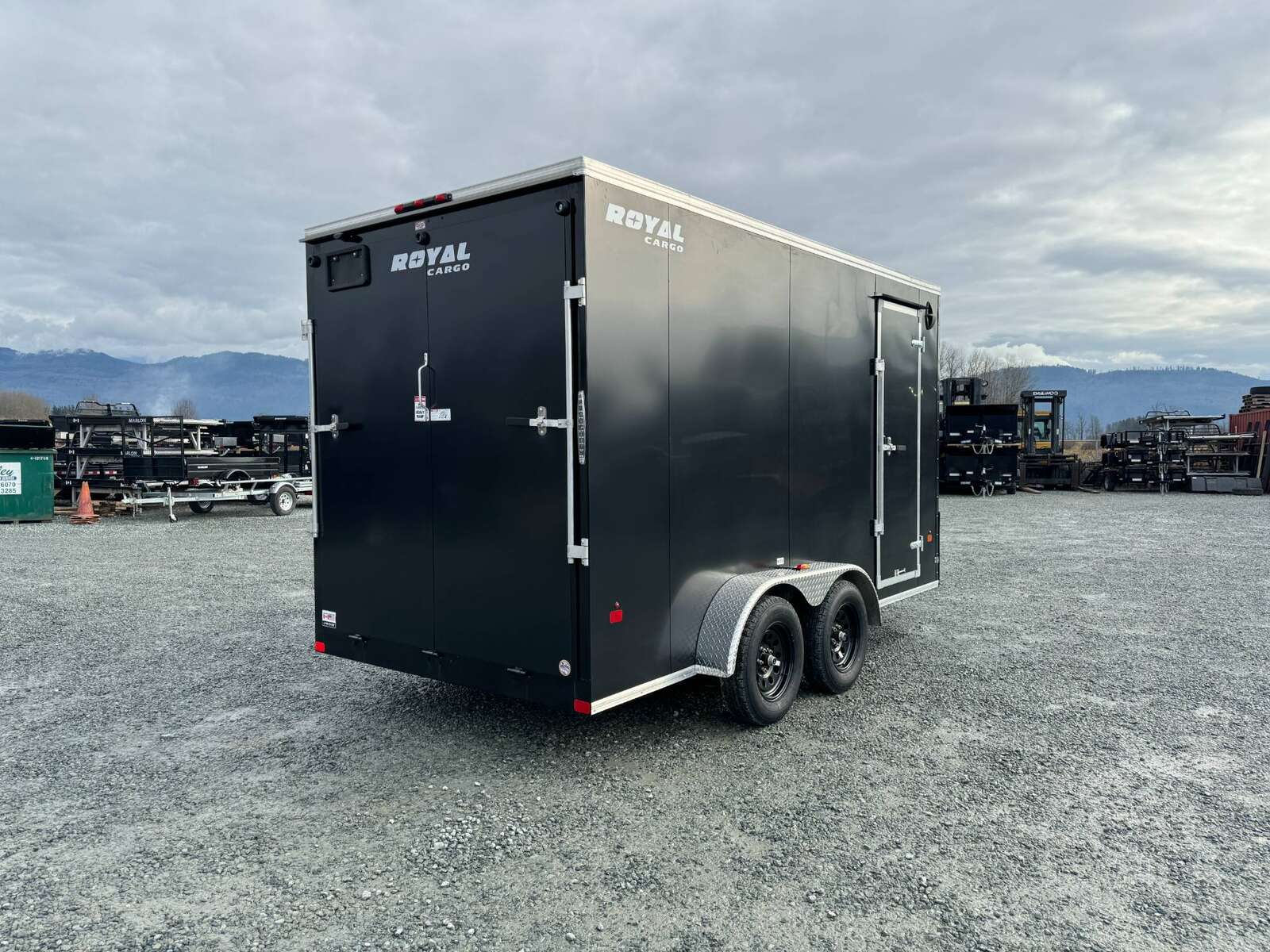 Photo of 2025 Royal Cargo 7X14 V Nose 7700LB GVW RAMP DOOR Black Enclosed Cargo Trailer Extra Tall