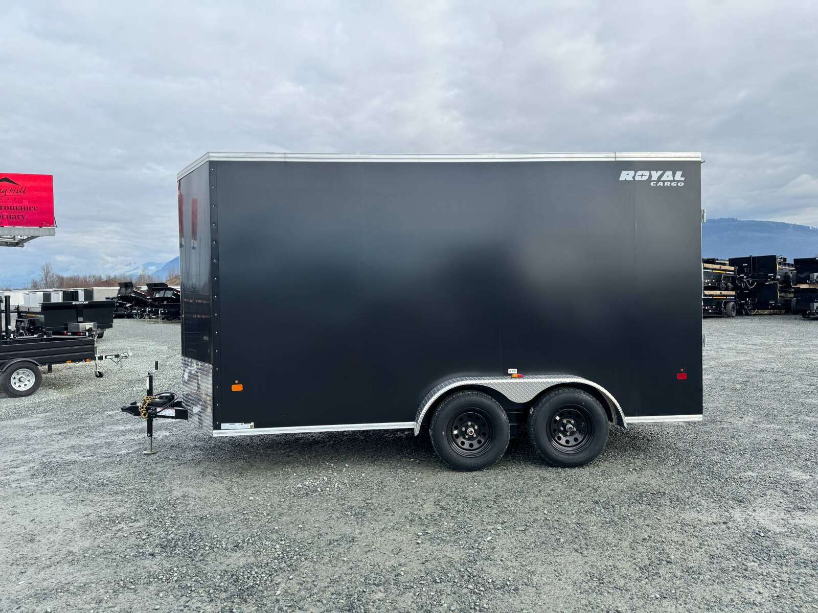 Photo of 2025 Royal Cargo 7X14 V Nose 7700LB GVW RAMP DOOR Black Enclosed Cargo Trailer Extra Tall