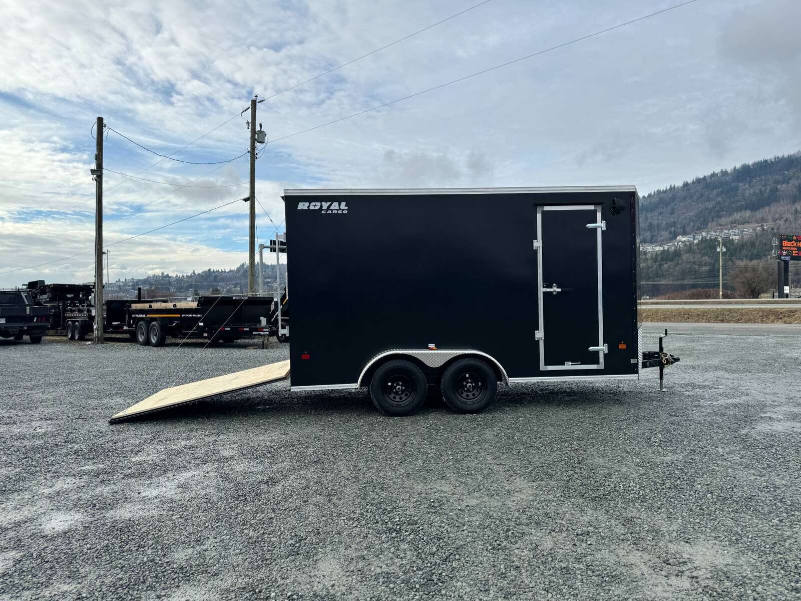 Photo of 2025 Royal Cargo 7X14 V Nose 7700LB GVW RAMP DOOR Black Enclosed Cargo Trailer Extra Tall