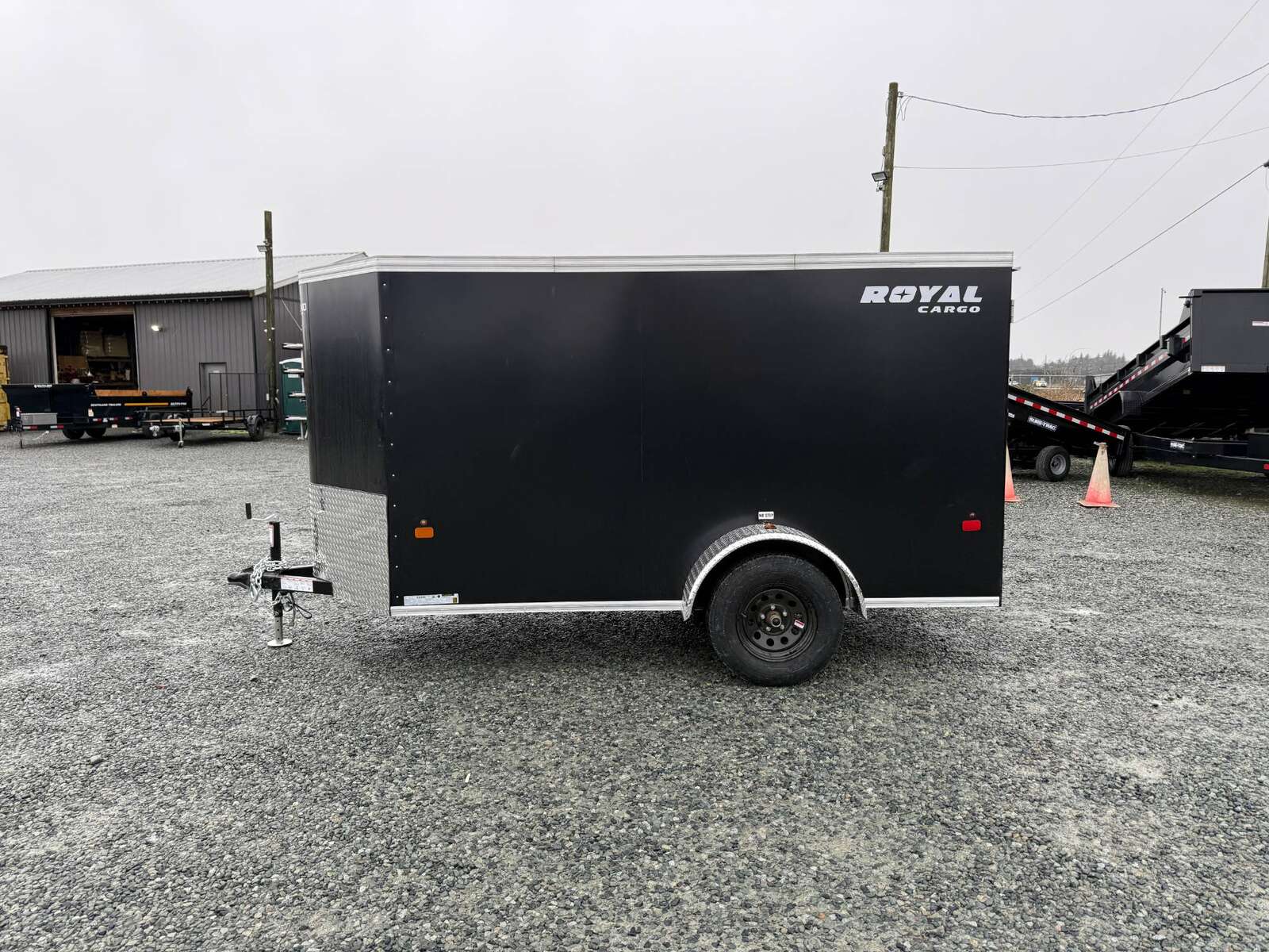 Photo of 2025 Royal Cargo 5x10 Enclosed Cargo Trailer V Nose Black Ramp Door