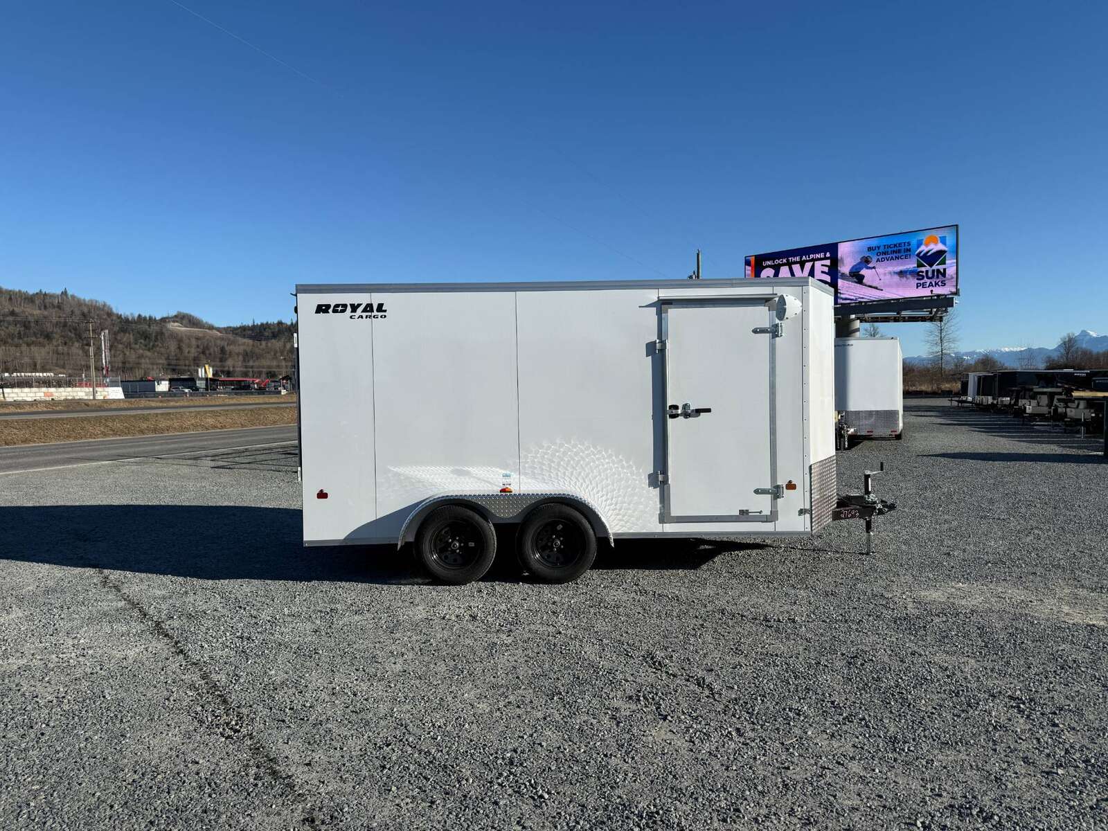 Photo of 2025 Royal Cargo 7X14 V Nose 7700LB GVW RAMP DOOR White Enclosed Cargo Trailer 78in Height