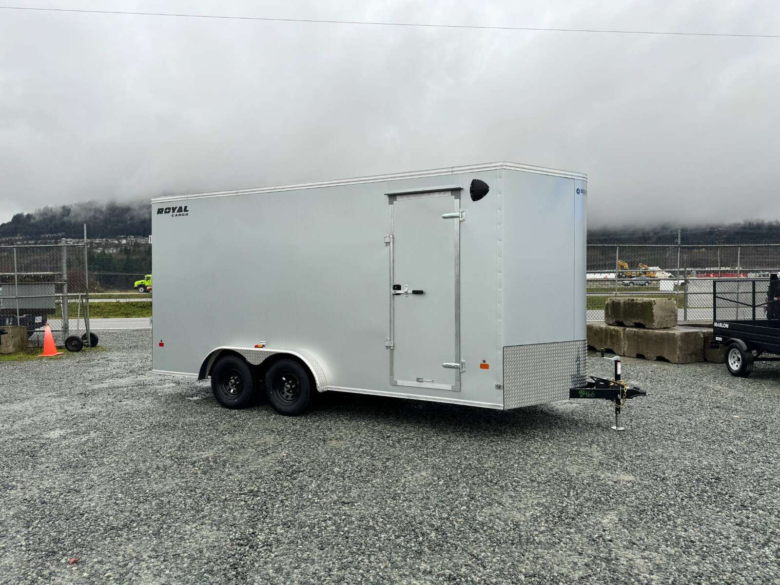 Photo of 2025 Royal Cargo 7.5X16 V-NOSE RAMP DOOR EXTRA HEIGHT Cargo / Enclosed Trailer Silver 7700lb GVW