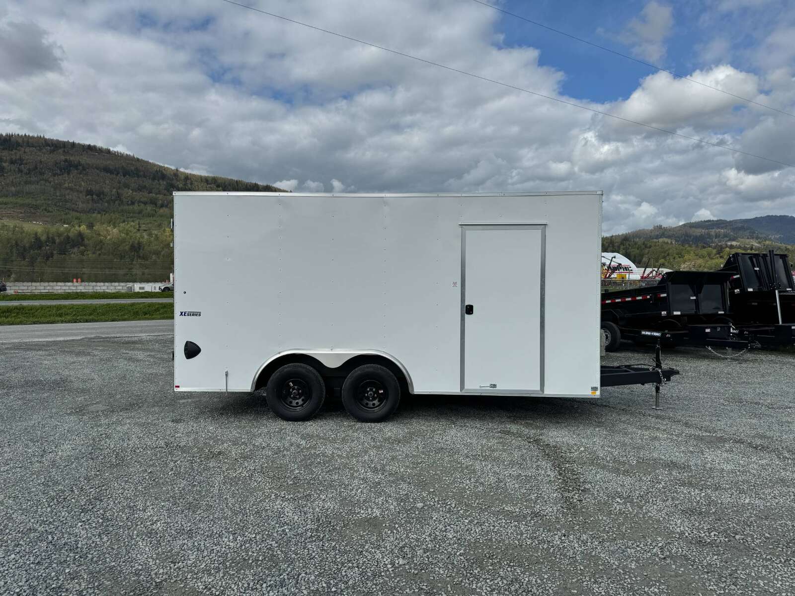 Photo of 2025 Mirage 8.5x16 XE V Nose 7000lb GVW Cargo / Enclosed Trailer Extra Heigh Barn Door White