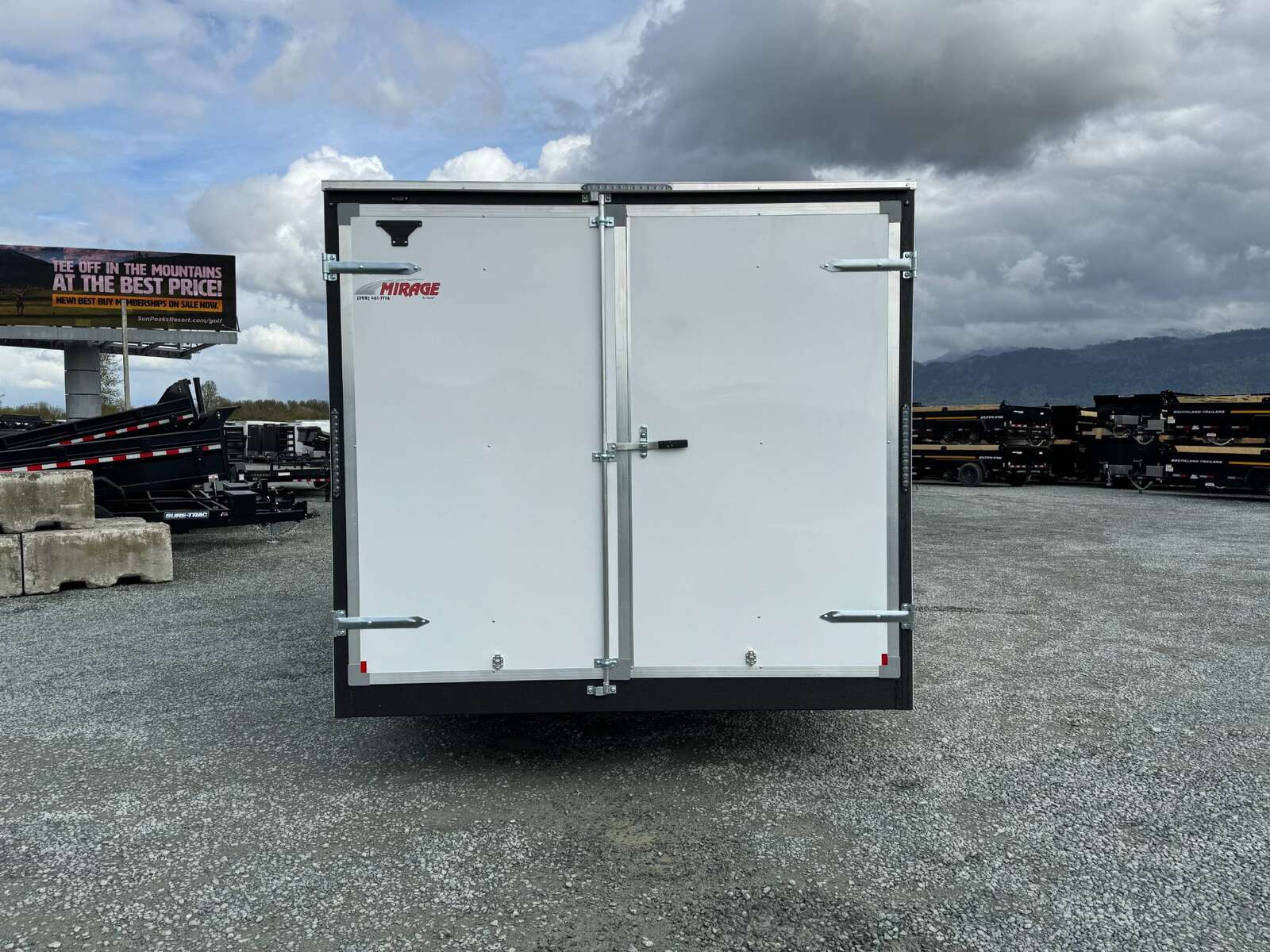 Photo of 2025 Mirage 8.5x16 XE V Nose 7000lb GVW Cargo / Enclosed Trailer Extra Heigh Barn Door White