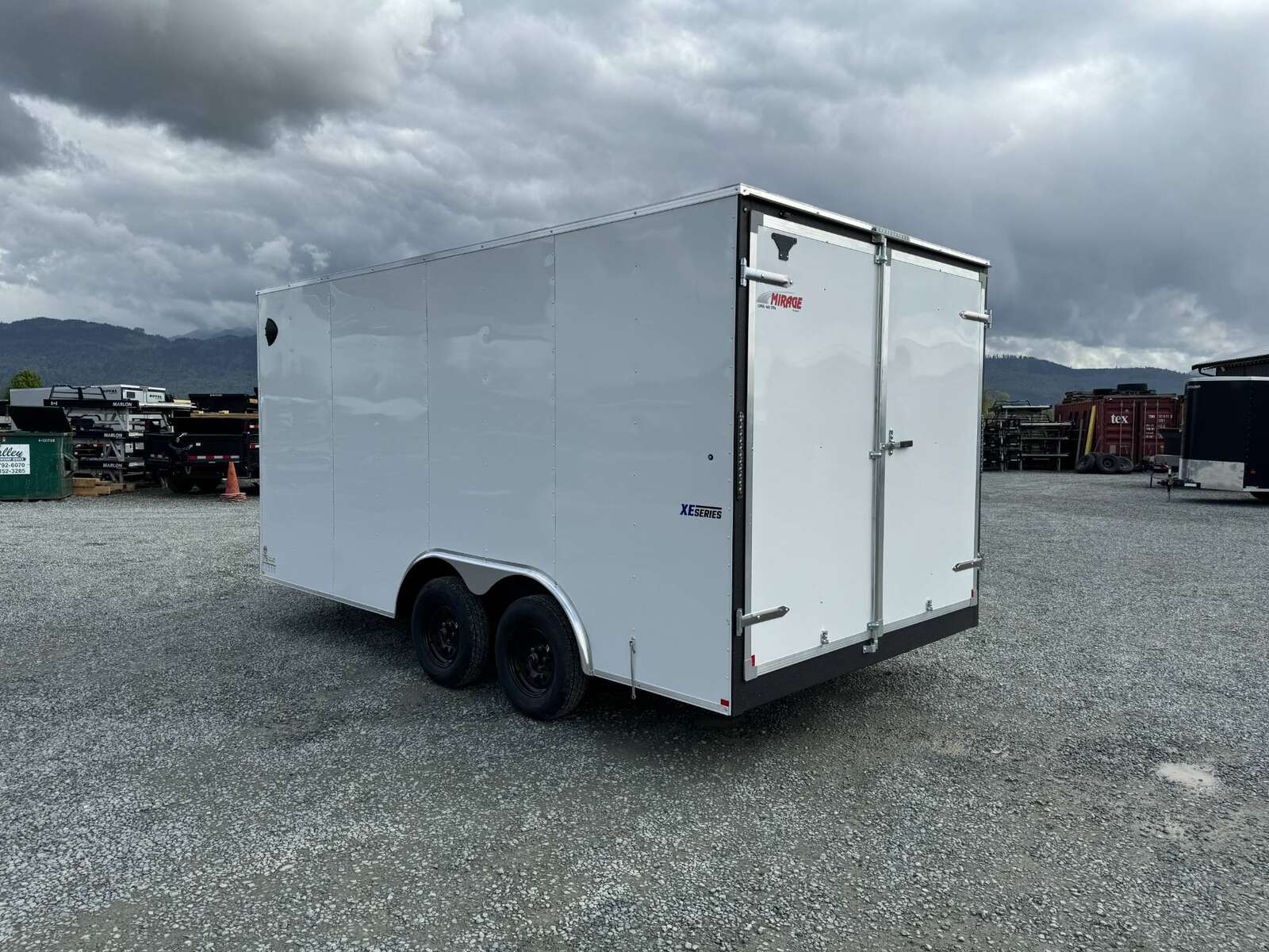 Photo of 2025 Mirage 8.5x16 XE V Nose 7000lb GVW Cargo / Enclosed Trailer Extra Heigh Barn Door White