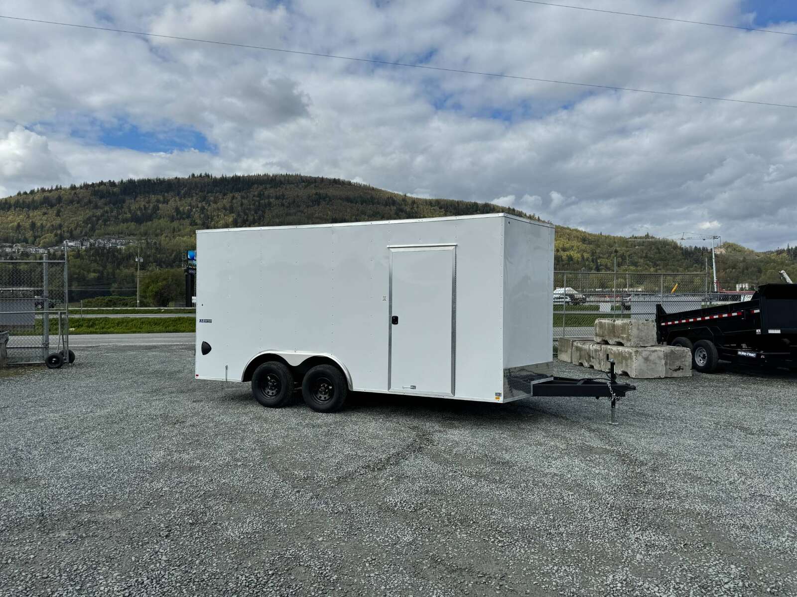 Photo of 2025 Mirage 8.5x16 XE V Nose 7000lb GVW Cargo / Enclosed Trailer Extra Heigh Barn Door White