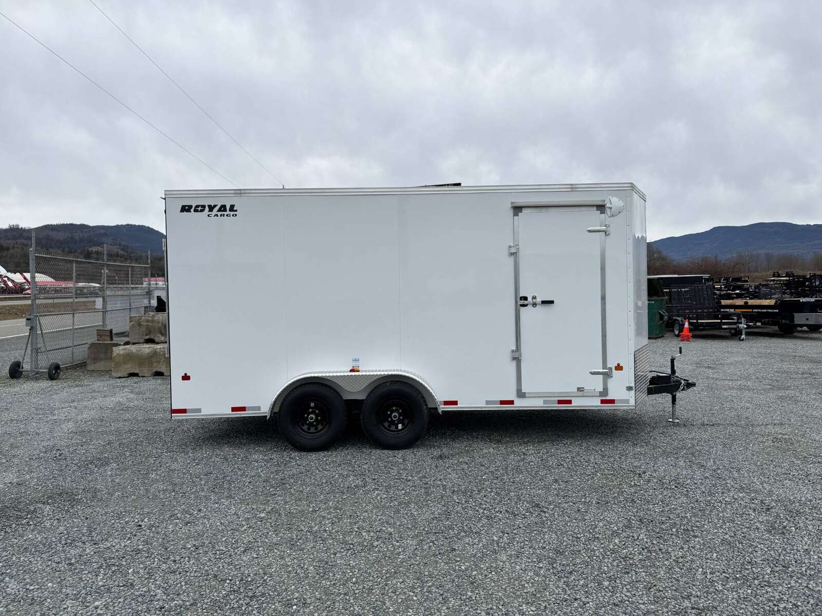 Photo of 2025 Royal Cargo 7x16 V Nose Enclosed / Cargo Trailer HD 11,400lb GVW w/ Ramp Door Extra Height White