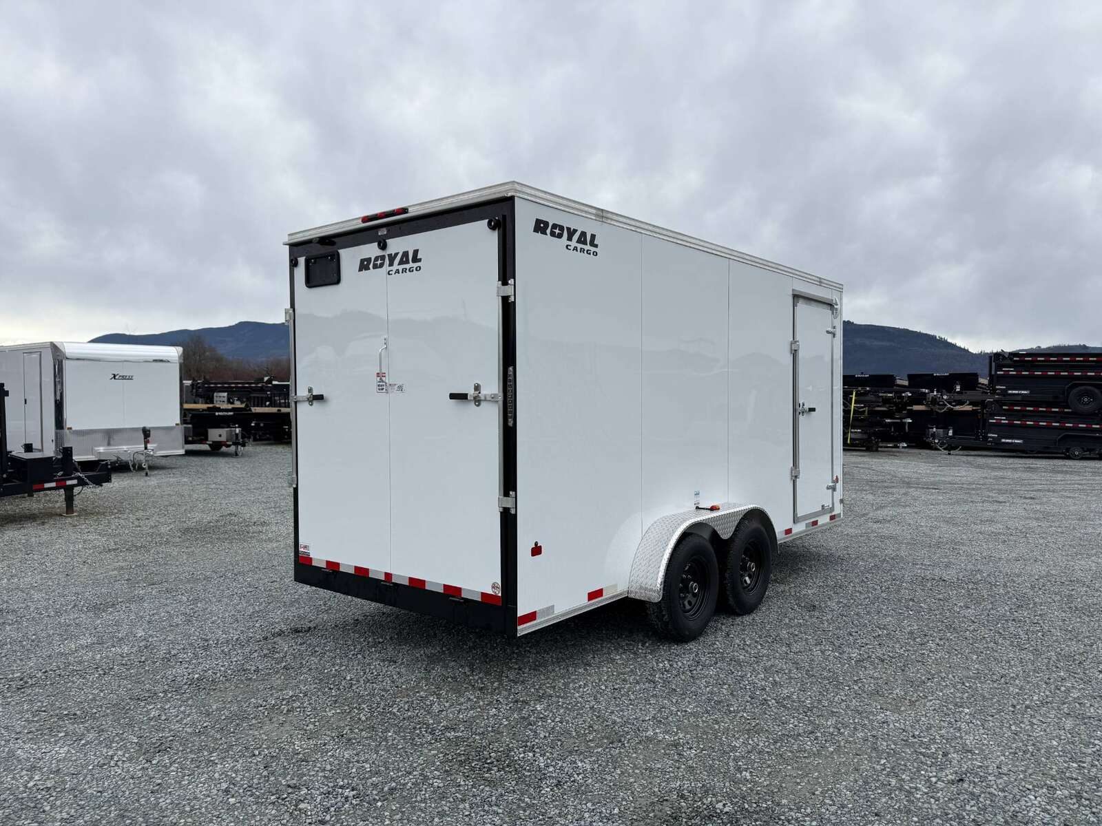 Photo of 2025 Royal Cargo 7x16 V Nose Enclosed / Cargo Trailer HD 11,400lb GVW w/ Ramp Door Extra Height White