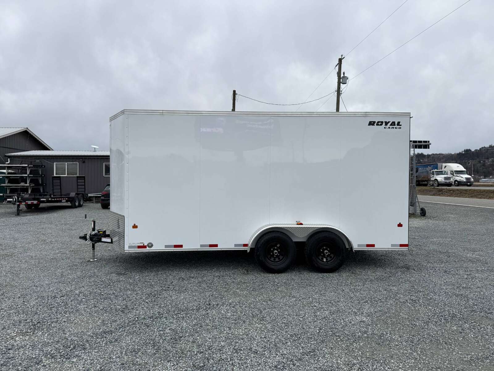 Photo of 2025 Royal Cargo 7x16 V Nose Enclosed / Cargo Trailer HD 11,400lb GVW w/ Ramp Door Extra Height White