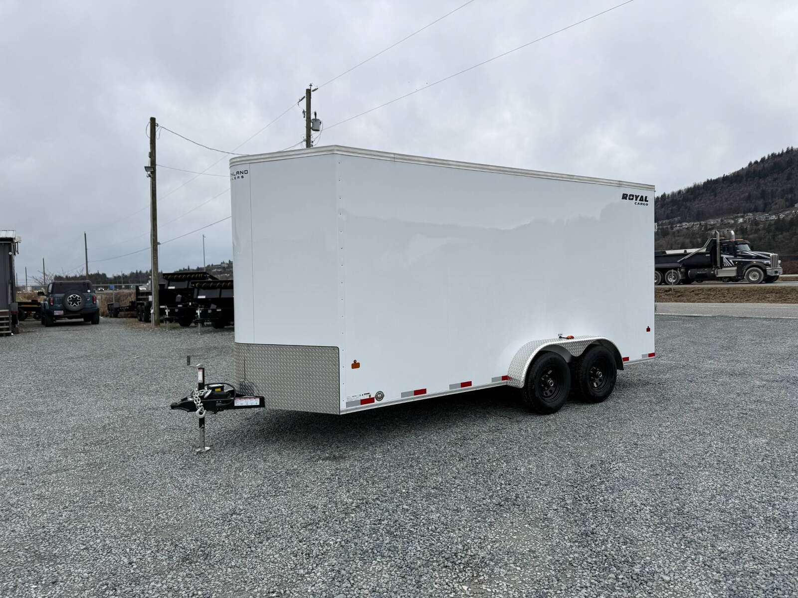 Photo of 2025 Royal Cargo 7x16 V Nose Enclosed / Cargo Trailer HD 11,400lb GVW w/ Ramp Door Extra Height White