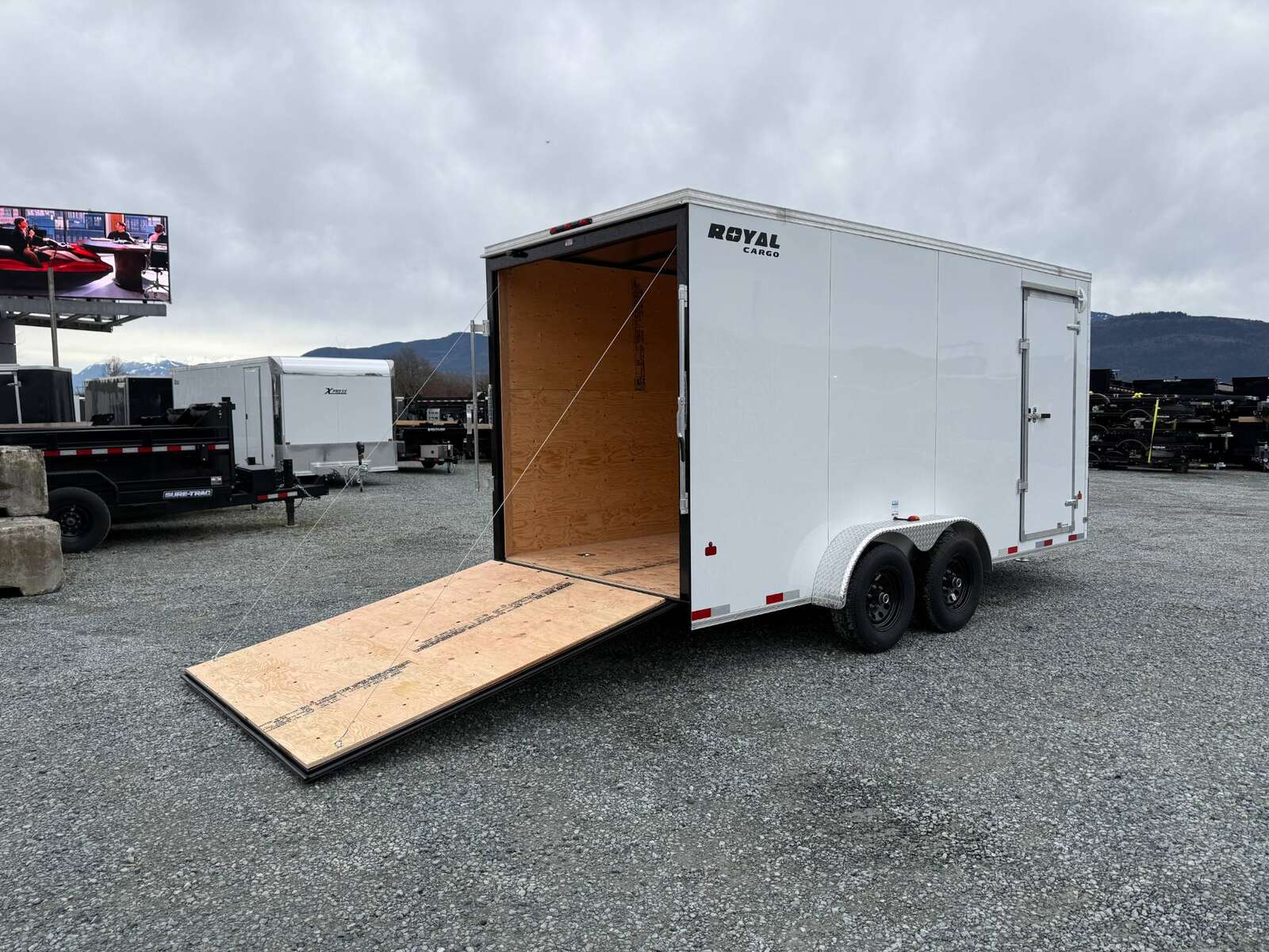 Photo of 2025 Royal Cargo 7x16 V Nose Enclosed / Cargo Trailer HD 11,400lb GVW w/ Ramp Door Extra Height White