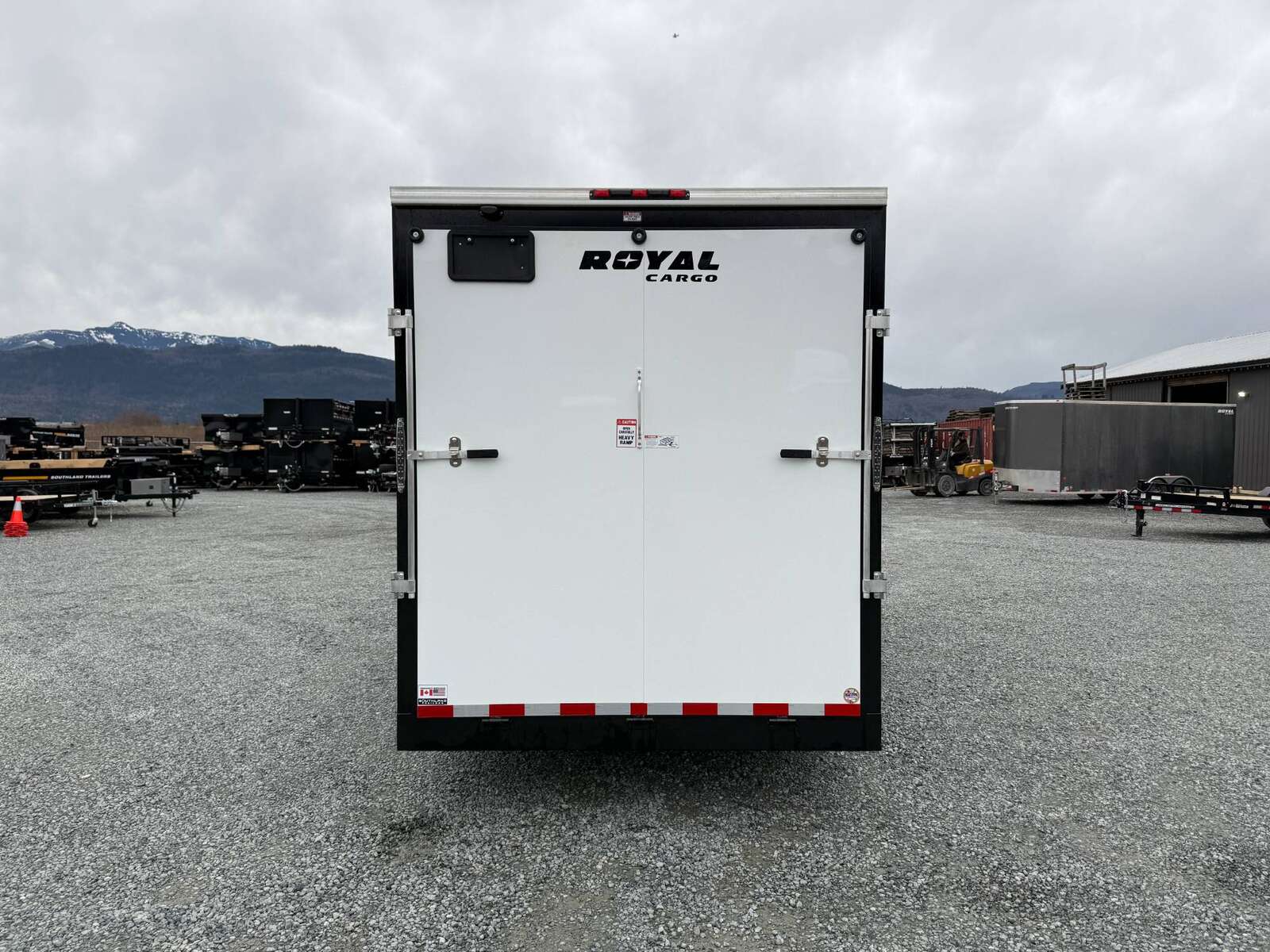 Photo of 2025 Royal Cargo 7x16 V Nose Enclosed / Cargo Trailer HD 11,400lb GVW w/ Ramp Door Extra Height White