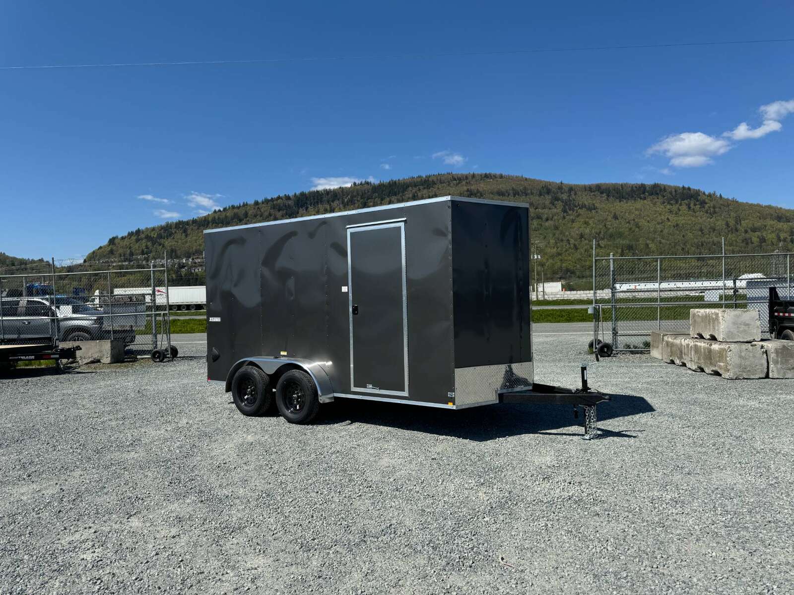 Photo of 2025 Mirage XE 7x14 Cargo / Enclosed Trailer V Nose Barn Doors Charcoal Grey Extra Height 7,000lb GVW