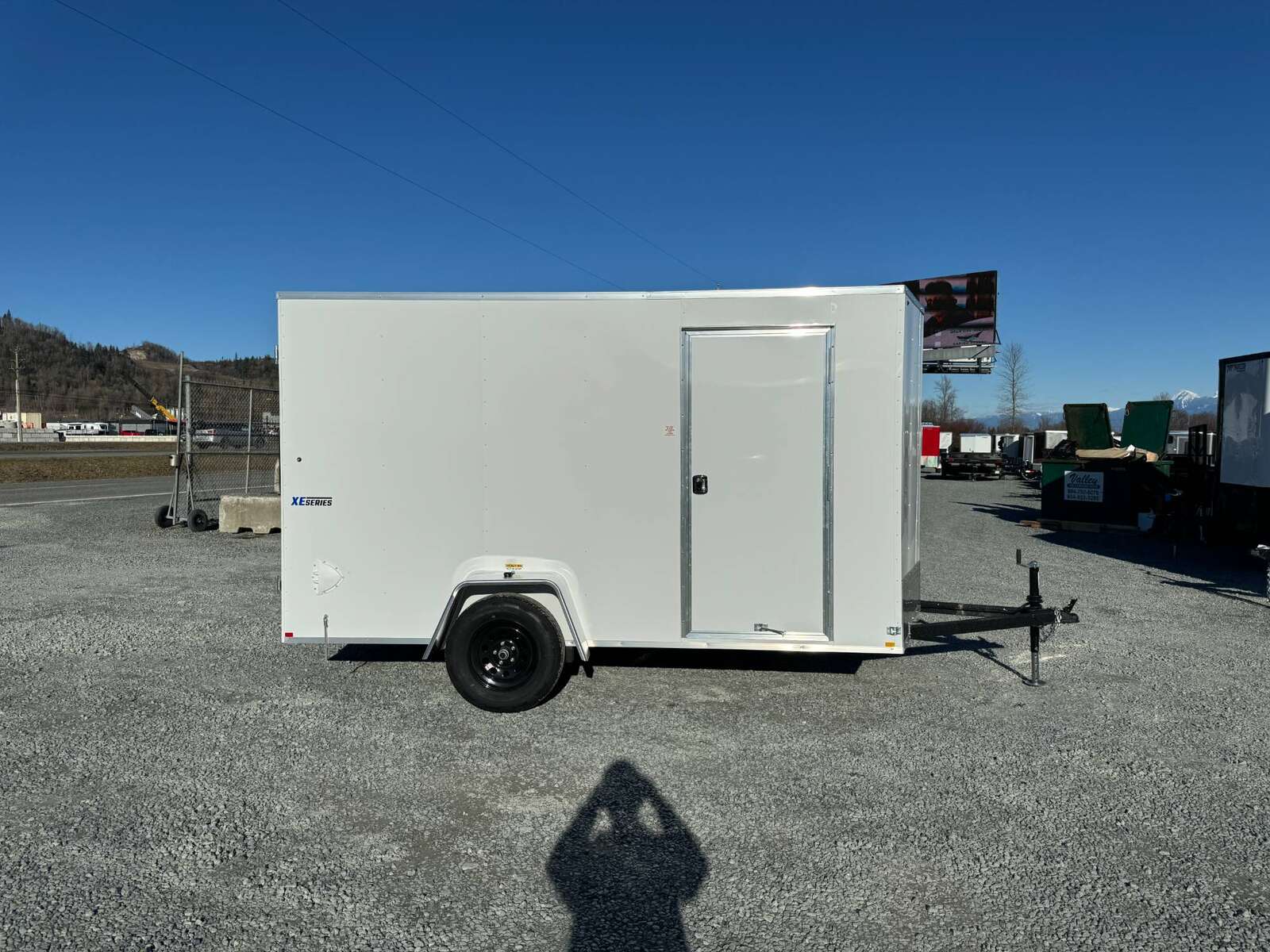Photo of 2025 Mirage XE 6x12 V Nose Cargo / Enclosed Trailer White Barn Door Extra Height 2990lb GVW