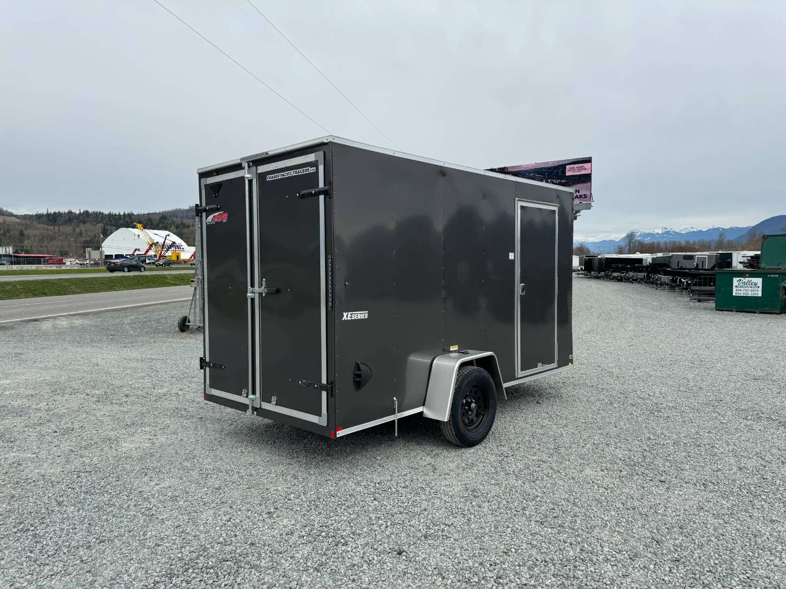 Photo of 2025 Mirage XE 6x12 V Nose Cargo / Enclosed Trailer Charcoal Grey Barn Doors Extra Height 2990lb GVW