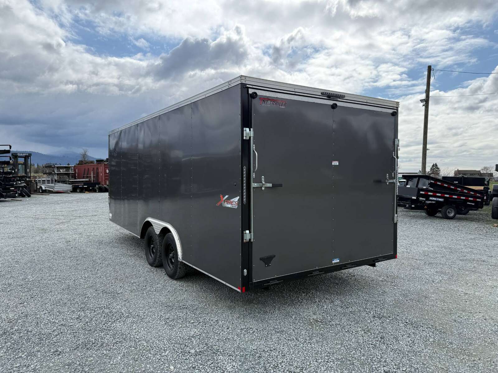 Photo of Pre Owned Used 2023 TNT 8.5x20 Cargo / Enclosed Trailer Car Hauler Charcoal Grey Ramp Door V Nose 7000lb GVW