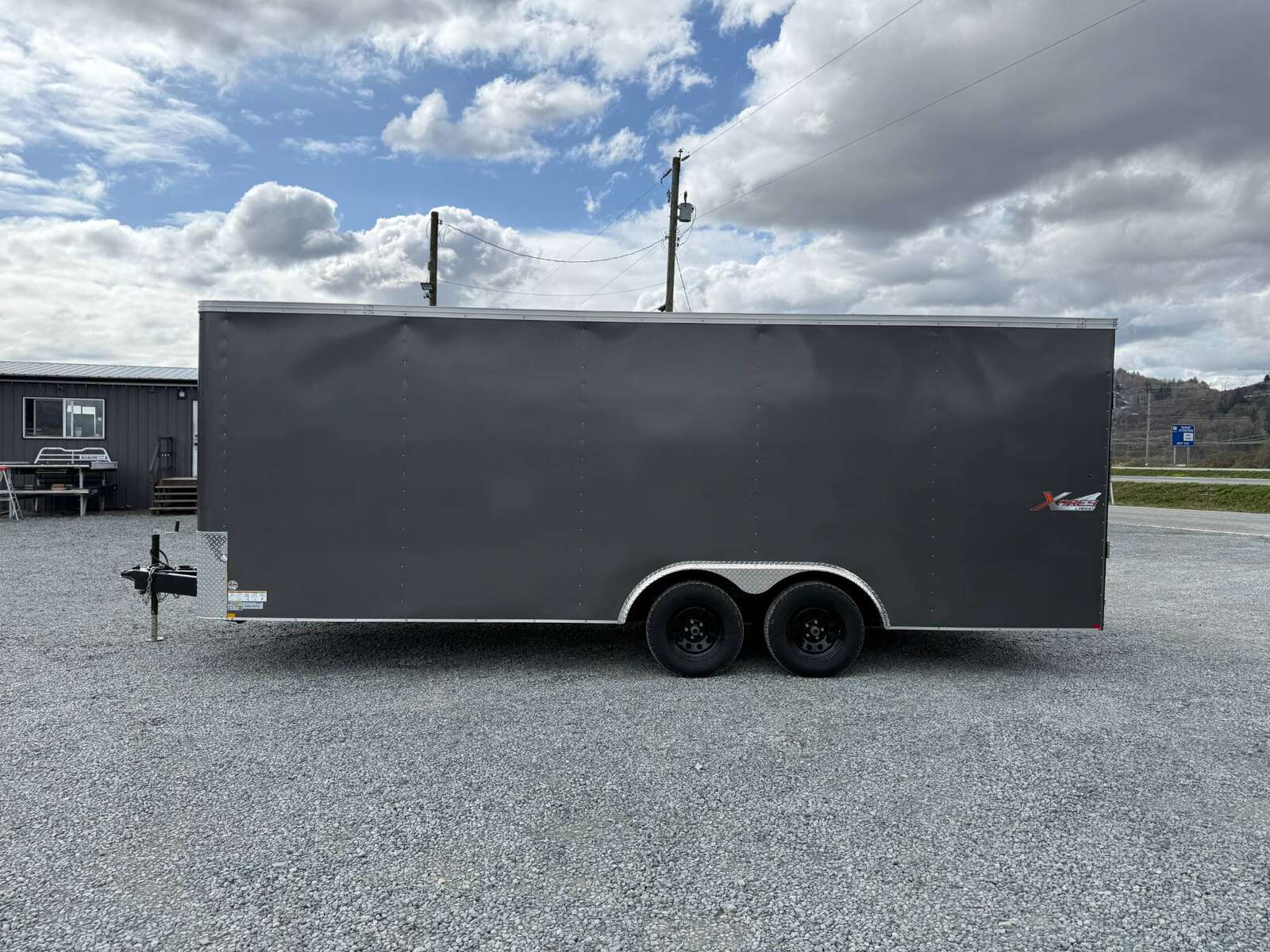 Photo of Pre Owned Used 2023 TNT 8.5x20 Cargo / Enclosed Trailer Car Hauler Charcoal Grey Ramp Door V Nose 7000lb GVW