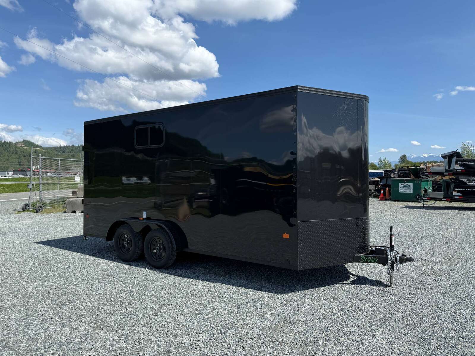 Photo of 2026 Royal 7.5X16 Cargo / Enclosed Trailer Camping Package w/ Window & Power Port RAMP DOOR EXTRA HEIGHT Black 7700lb GVW