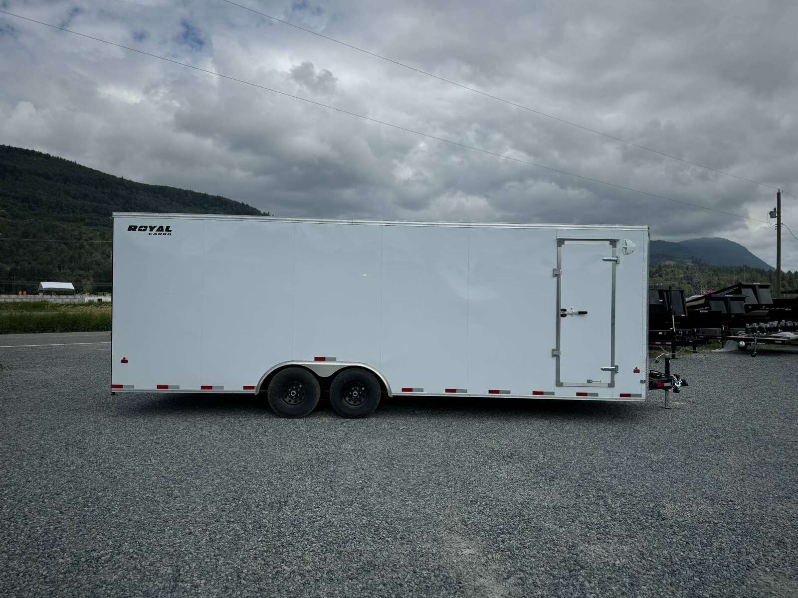 Photo of 2026 Royal Cargo 8.5x24 V Nose Car Hauler Cargo / Enclosed Trailer 11,400lb GVW White Ramp Door Extra Height
