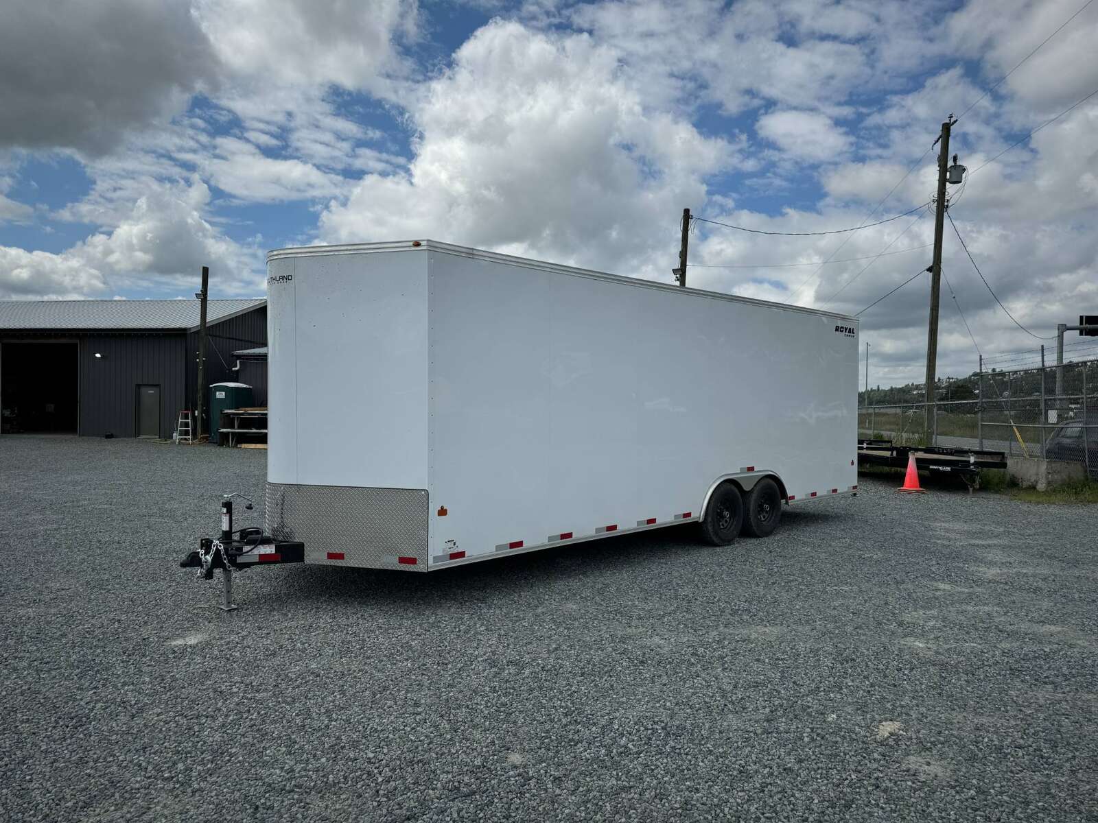 Photo of 2026 Royal Cargo 8.5x24 V Nose Car Hauler Cargo / Enclosed Trailer 11,400lb GVW White Ramp Door Extra Height