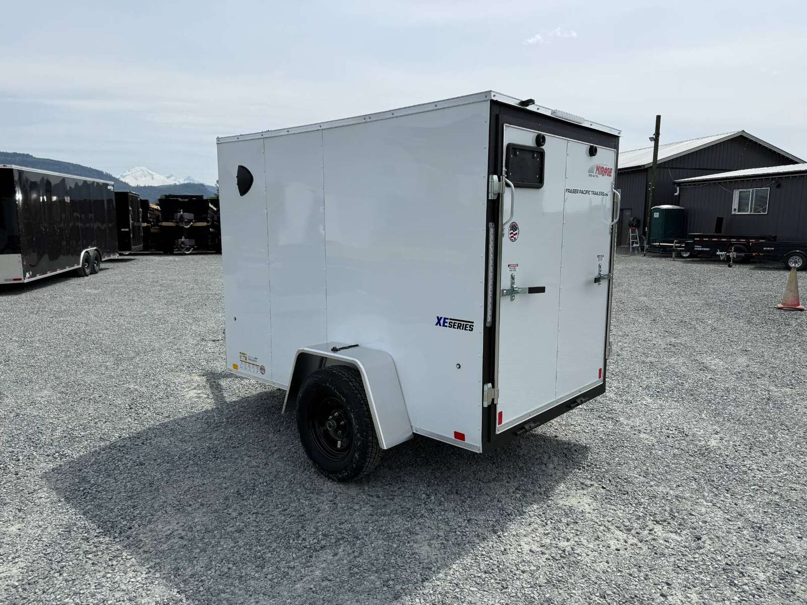 Photo of 2025 Mirage XE 5x8 V Nose Cargo / Enclosed Trailer White Ramp Door 2990lb GVW