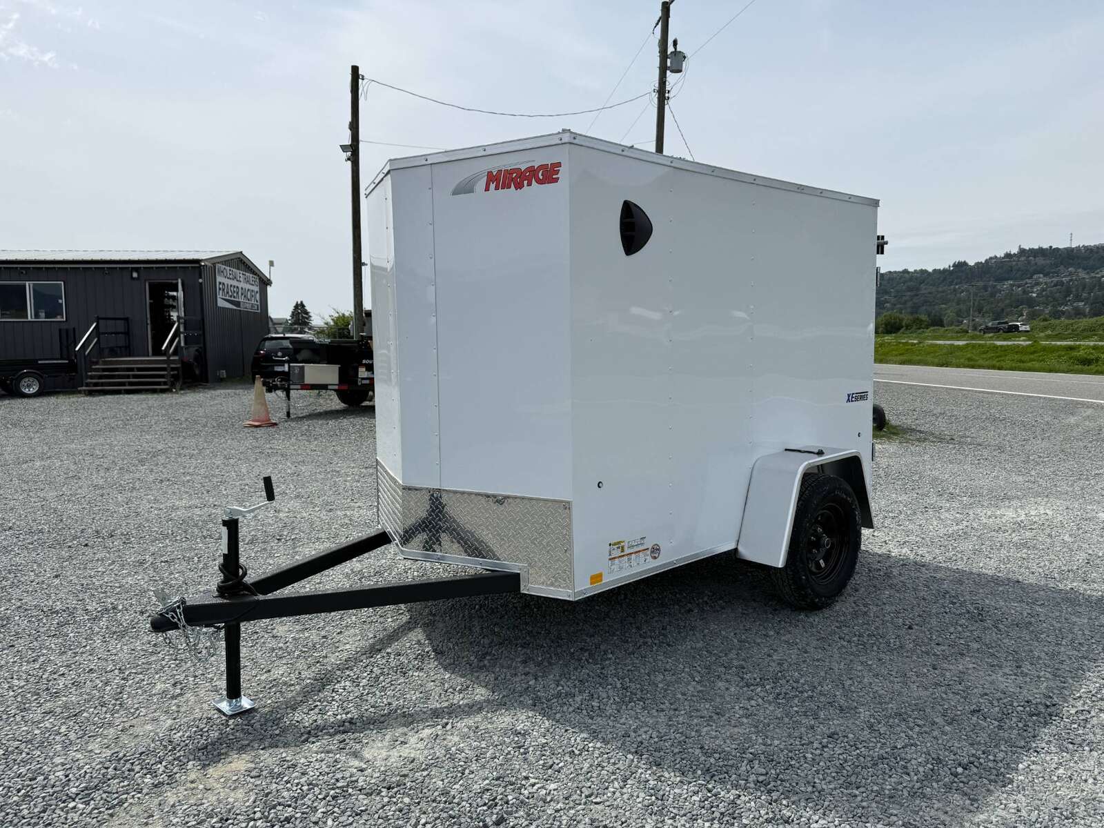 Photo of 2025 Mirage XE 5x8 V Nose Cargo / Enclosed Trailer White Ramp Door 2990lb GVW