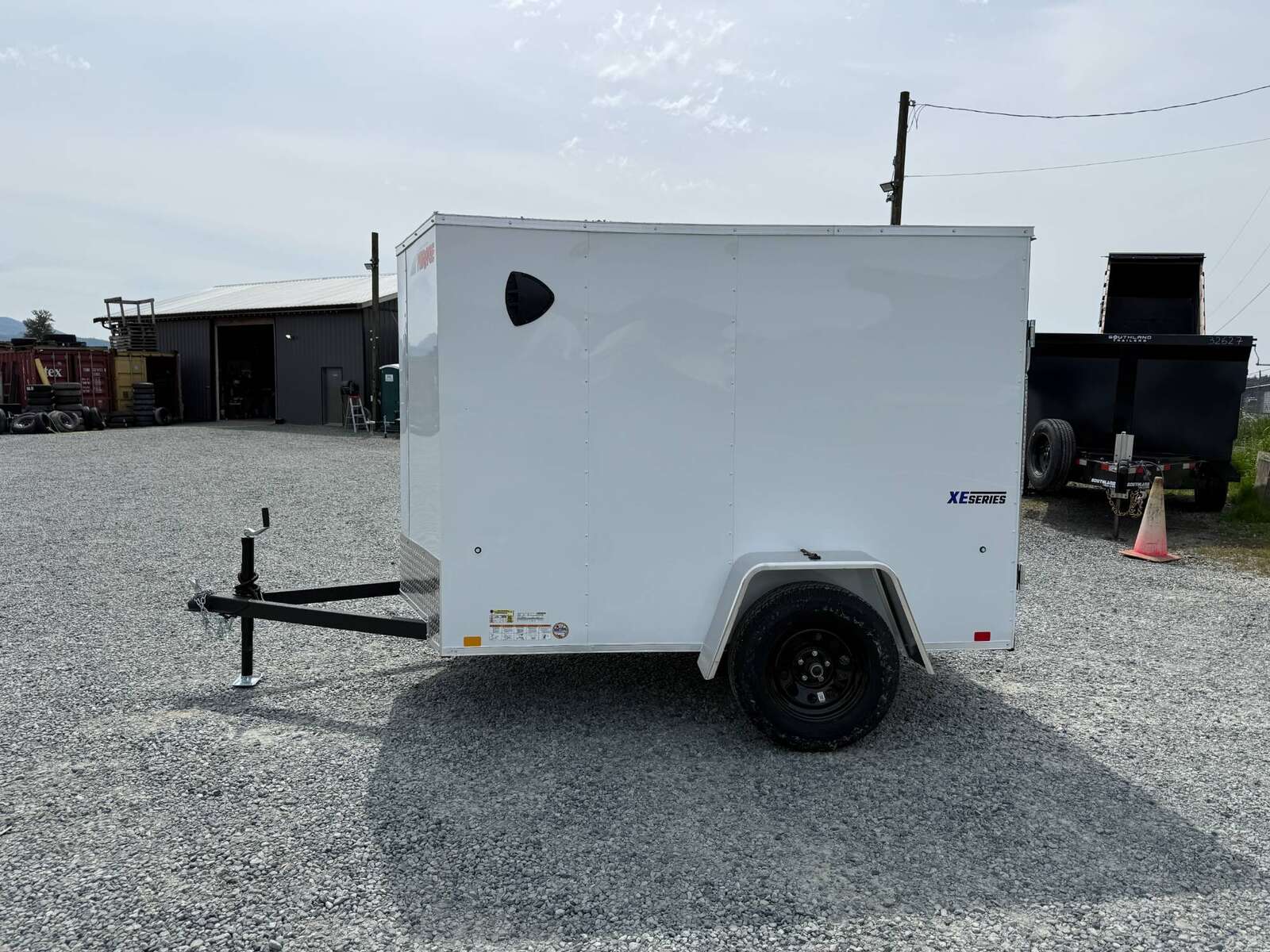 Photo of 2025 Mirage XE 5x8 V Nose Cargo / Enclosed Trailer White Ramp Door 2990lb GVW