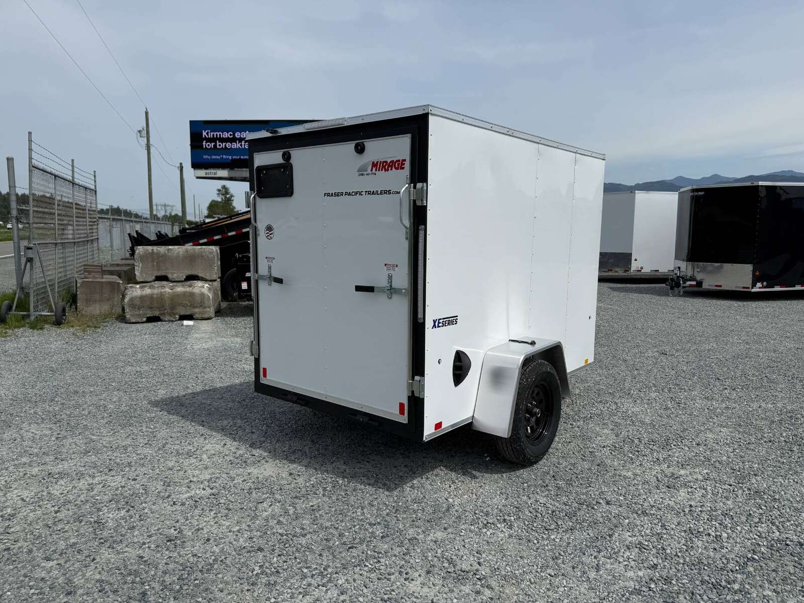 Photo of 2025 Mirage XE 5x8 V Nose Cargo / Enclosed Trailer White Ramp Door 2990lb GVW