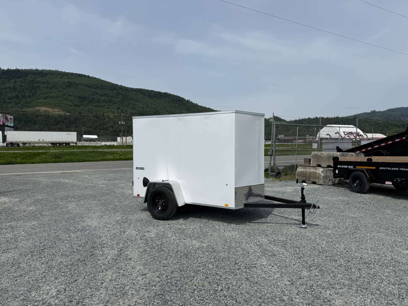 Photo of 2025 Mirage XE 5x8 V Nose Cargo / Enclosed Trailer White Ramp Door 2990lb GVW