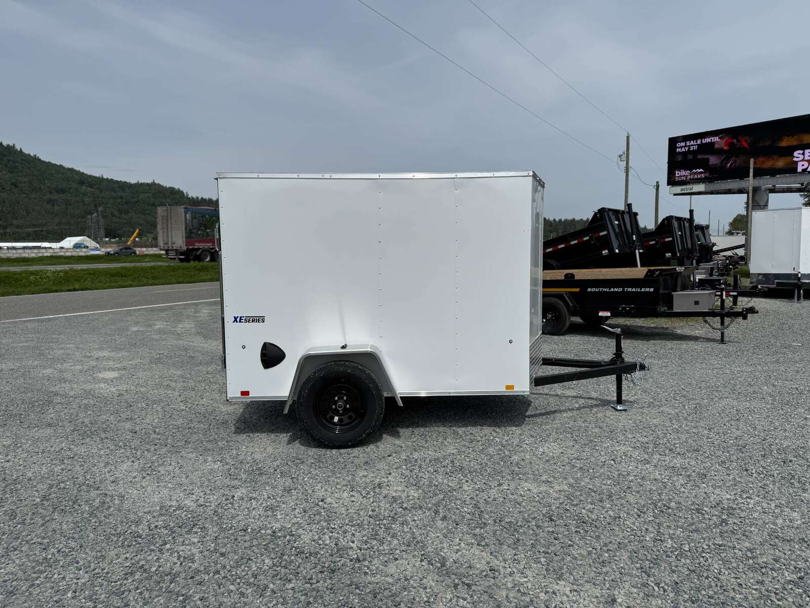 Photo of 2025 Mirage XE 5x8 V Nose Cargo / Enclosed Trailer White Ramp Door 2990lb GVW