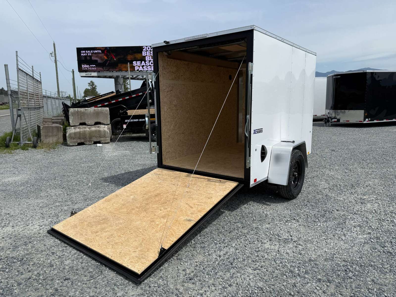 Photo of 2025 Mirage XE 5x8 V Nose Cargo / Enclosed Trailer White Ramp Door 2990lb GVW