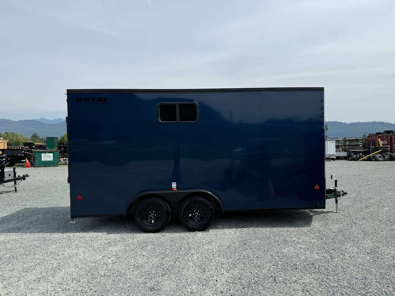 Photo of 2026 Royal 7.5X16 Cargo / Enclosed Trailer Camping Package w/ Window & Power Port RAMP DOOR EXTRA HEIGHT Blue 7700lb GVW