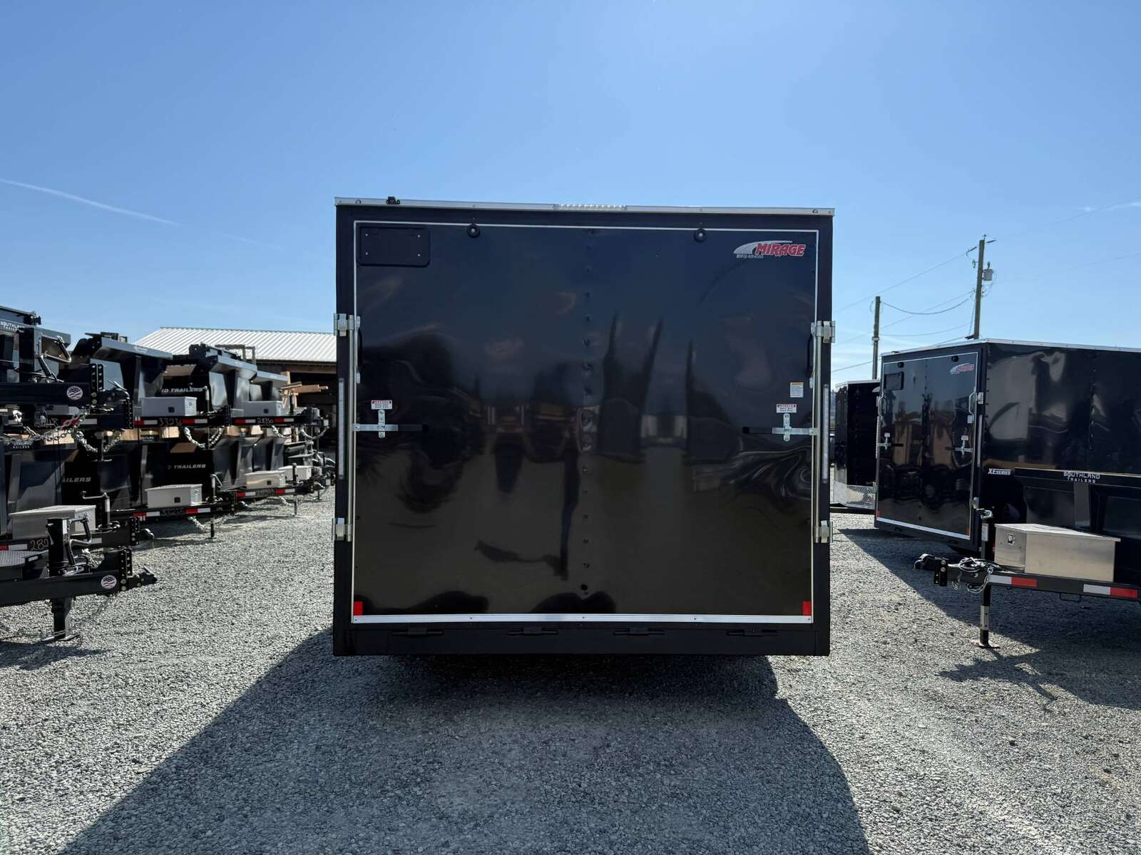 Photo of **SCRATCH SPECIAL** 2025 Mirage XE 8.5x16 V Nose Extra Height Cargo / Enclosed Trailer Ramp Door Black 7000lb GVW