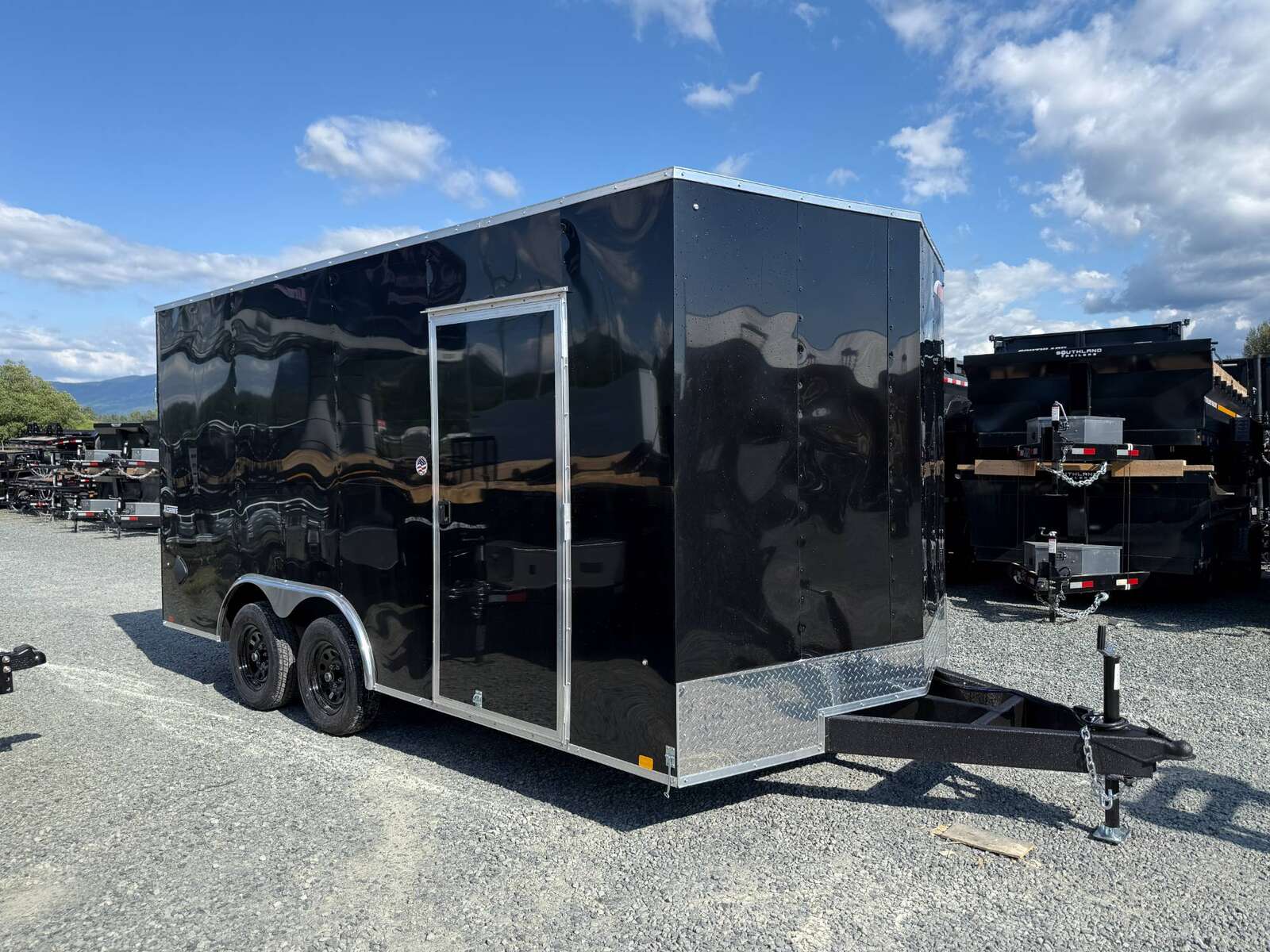 Photo of **SCRATCH SPECIAL** 2025 Mirage XE 8.5x16 V Nose Extra Height Cargo / Enclosed Trailer Ramp Door Black 7000lb GVW