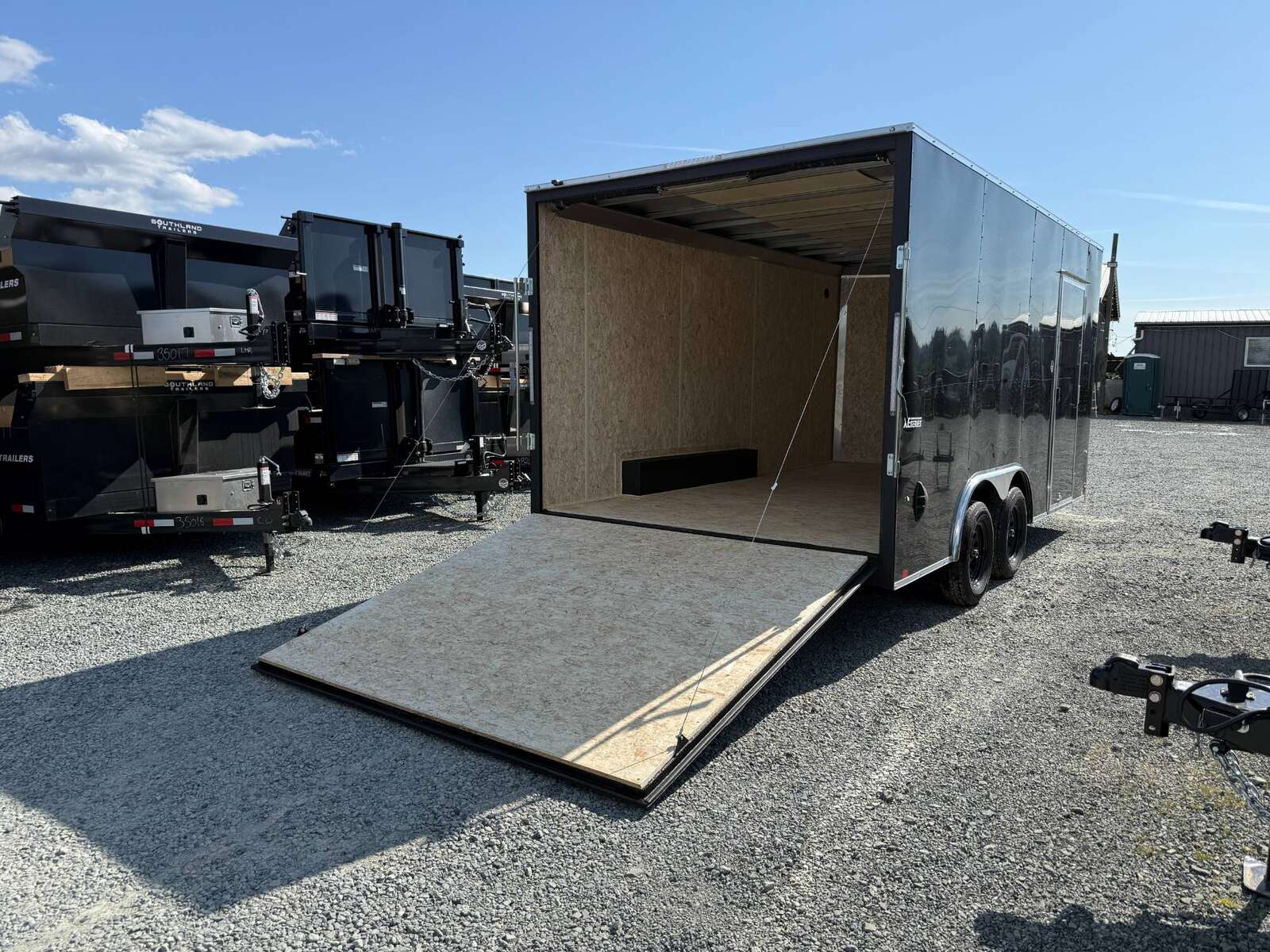 Photo of **SCRATCH SPECIAL** 2025 Mirage XE 8.5x16 V Nose Extra Height Cargo / Enclosed Trailer Ramp Door Black 7000lb GVW