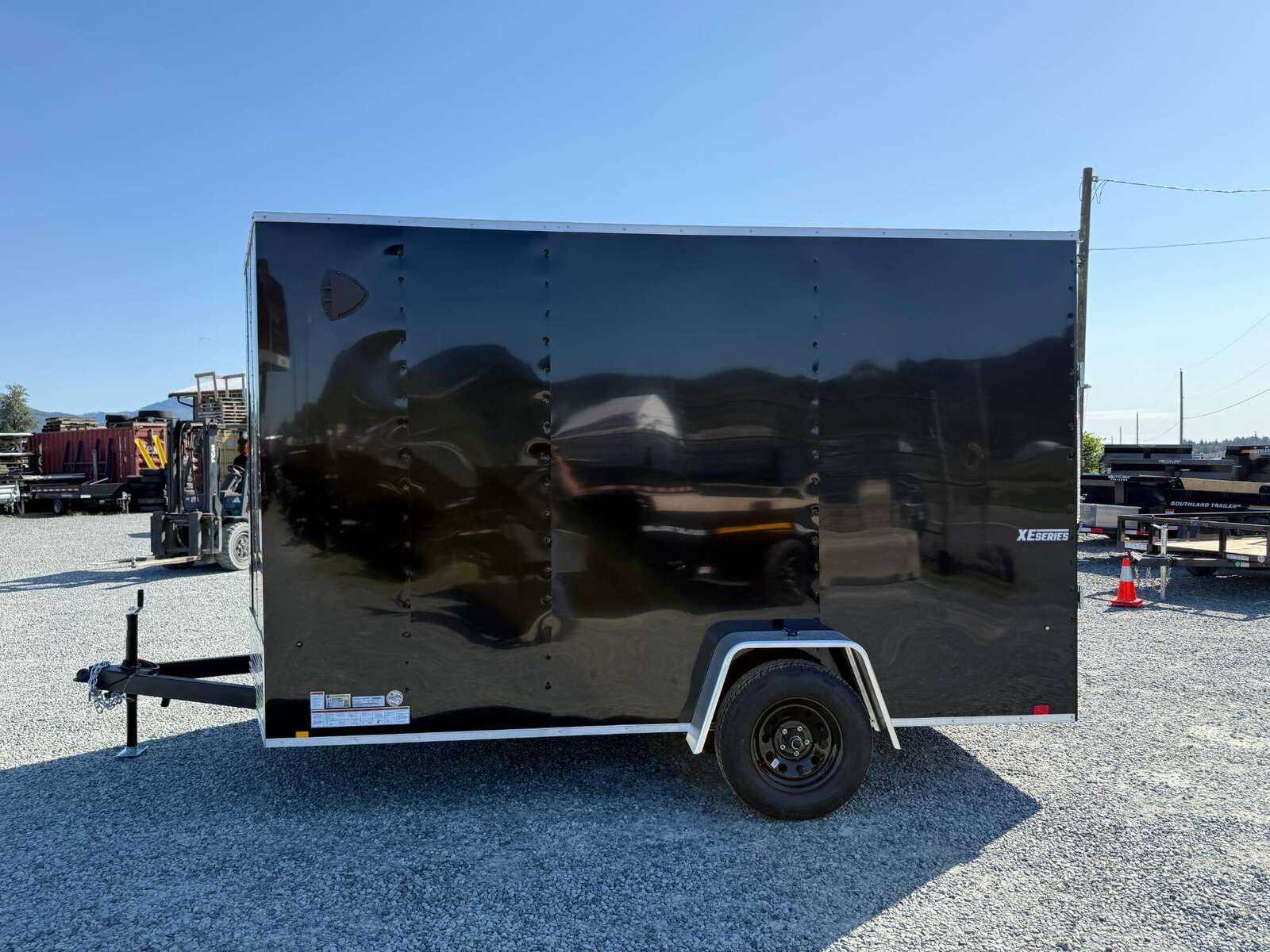 Photo of 2025 Mirage XE 7x12 Cargo Enclosed Trailer Extra Height Black Ramp Door Single Axle w/ Electric Brakes
