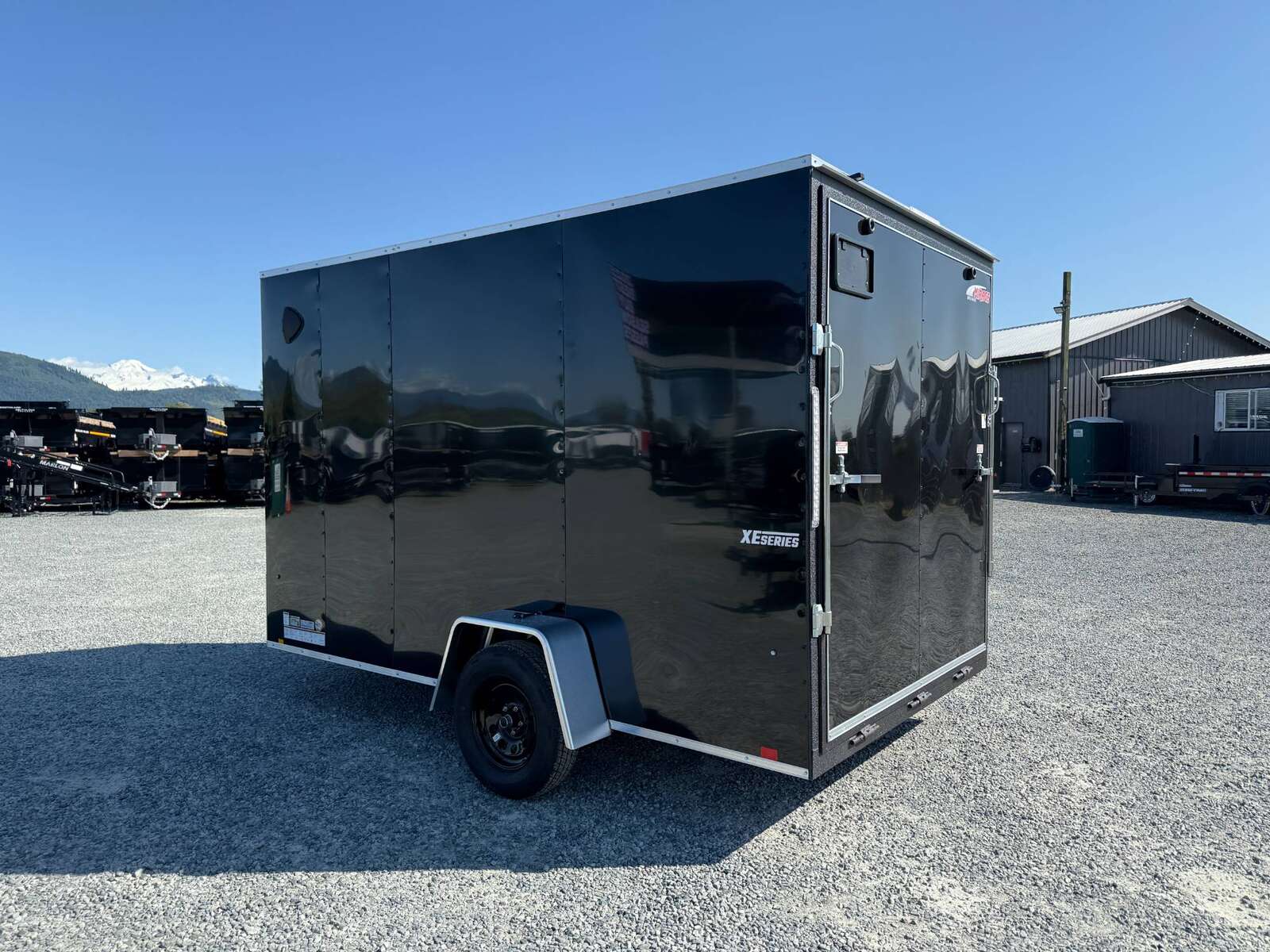 Photo of 2025 Mirage XE 7x12 Cargo Enclosed Trailer Extra Height Black Ramp Door Single Axle w/ Electric Brakes