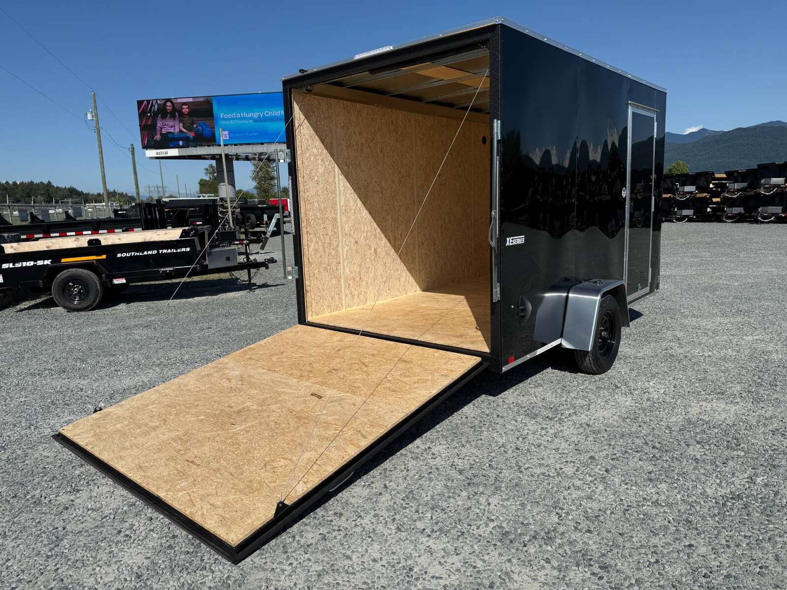 Photo of 2025 Mirage XE 7x12 Cargo Enclosed Trailer Extra Height Black Ramp Door Single Axle w/ Electric Brakes