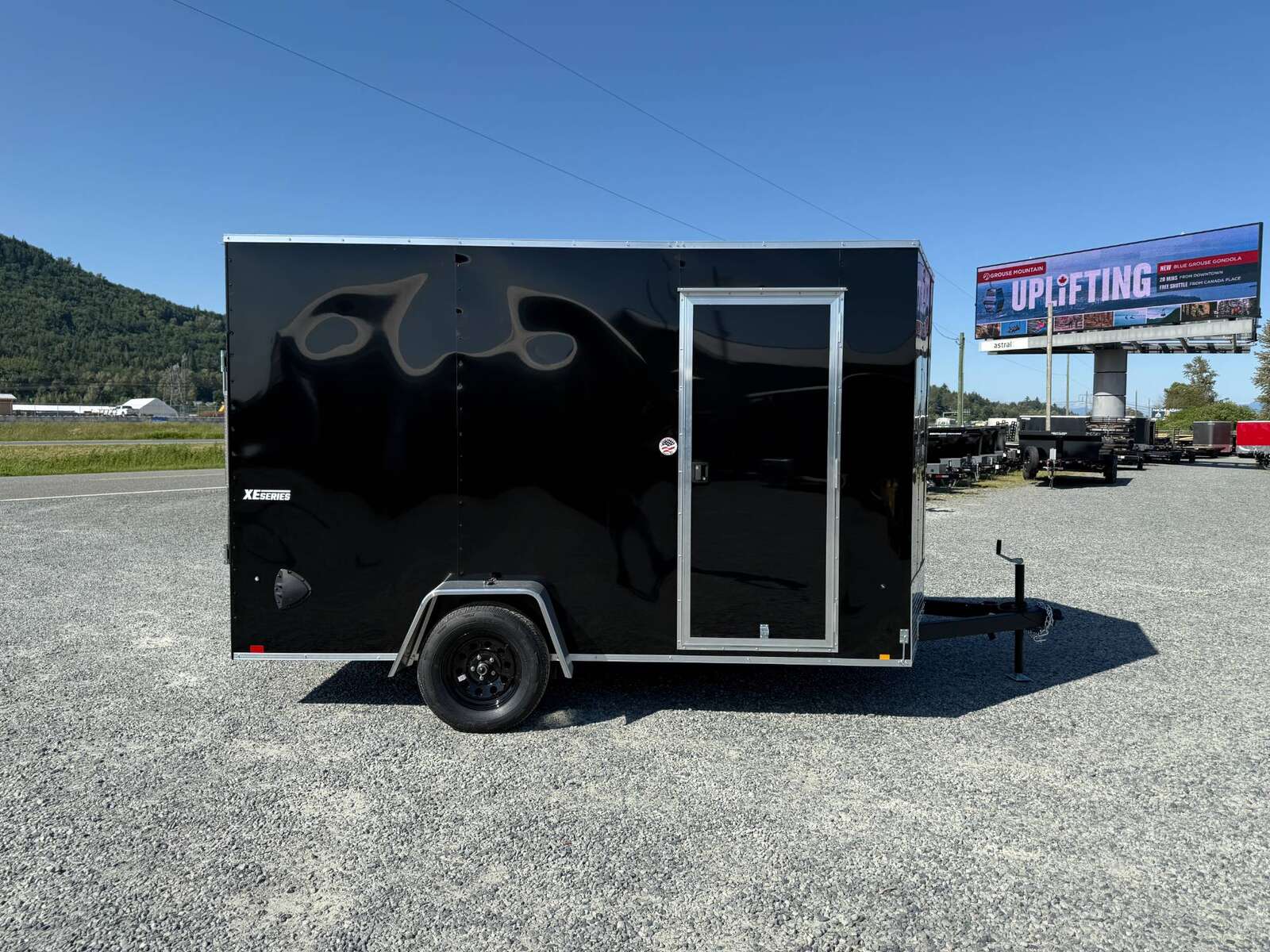 Photo of 2025 Mirage XE 7x12 Cargo Enclosed Trailer Extra Height Black Ramp Door Single Axle w/ Electric Brakes