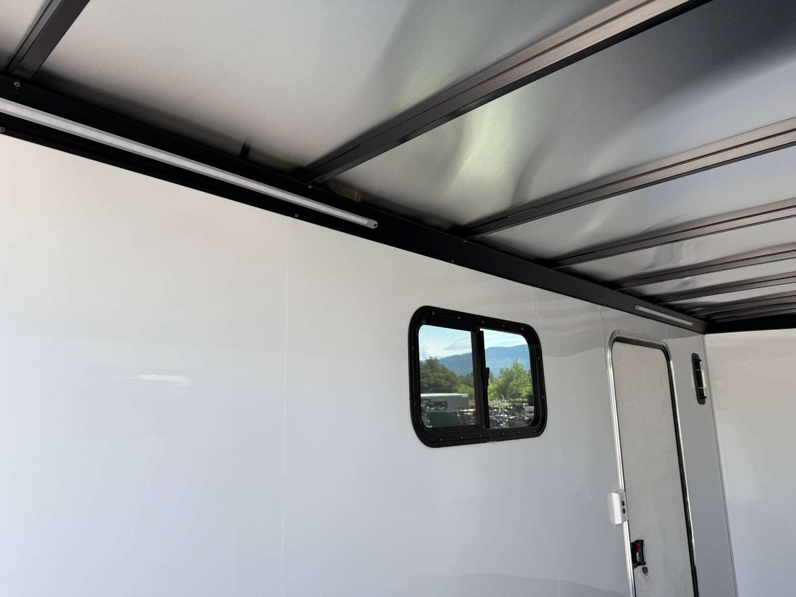 Photo of 2026 Royal 8.5x16 V Nose Cargo Enclosed Trailer Camping Package Black w/ Blackout Pkg, Ramp Door, White Walls, 2x Windows & More!