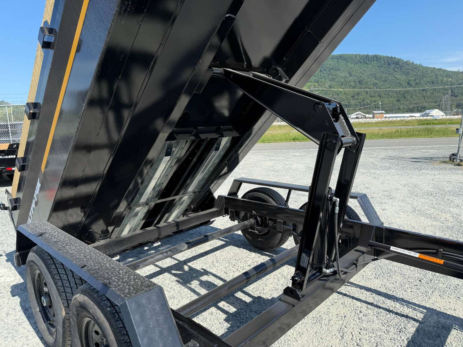 Photo of 2025 Southland 7x14 Dump Trailer 15,400lbs GVW with Tarp And Ramps (SL714-14K)