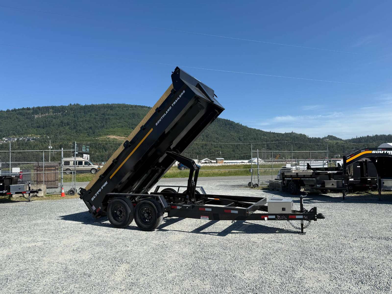 Photo of 2025 Southland 7x14 Dump Trailer 15,400lbs GVW with Tarp And Ramps (SL714-14K)