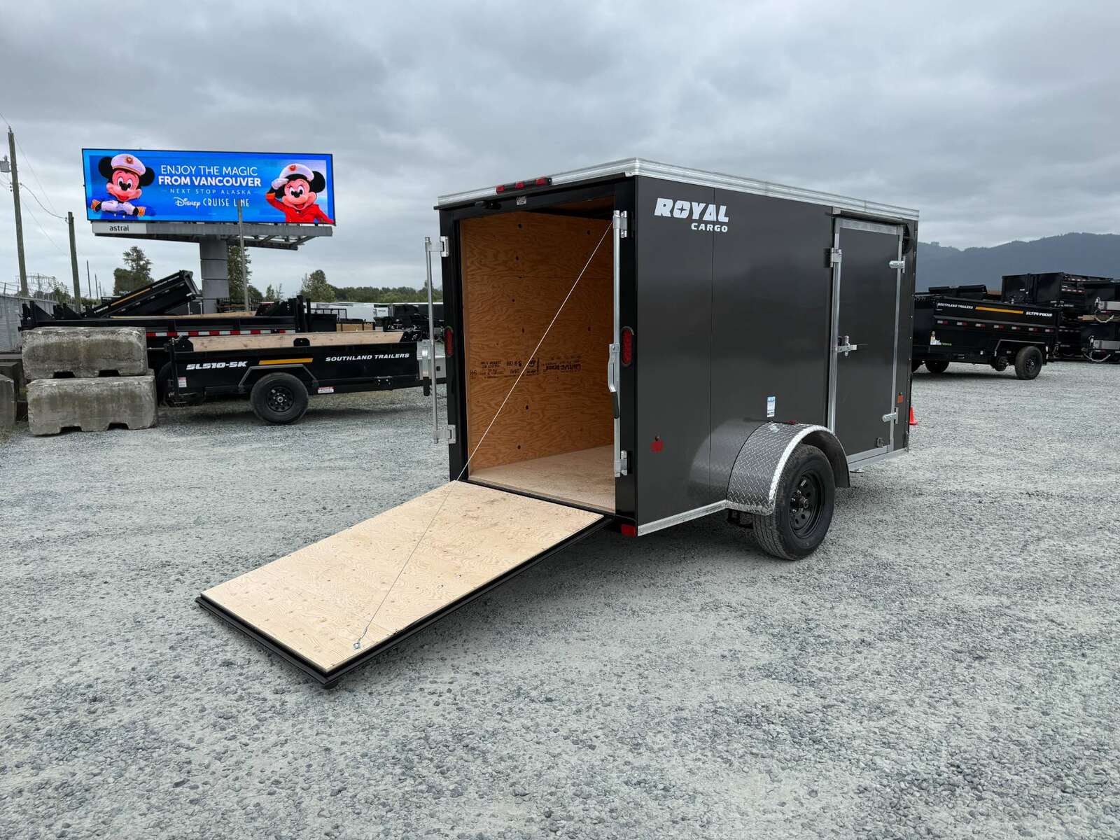 Photo of 2026 Royal Cargo 5x10 Cargo Enclosed Trailer V Nose Ramp Door Charcoal Grey Side Door