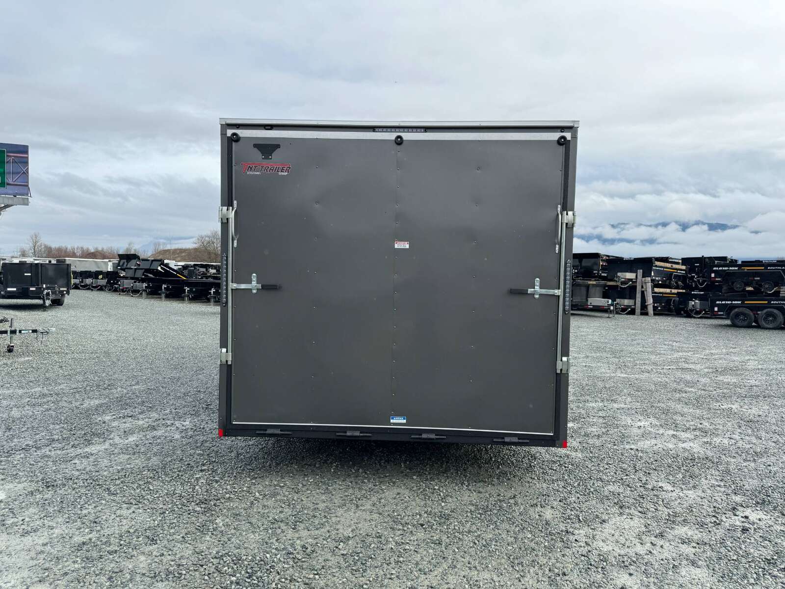 Photo of 2025 Mirage XE 8.5x24 V Nose Cargo / Enclosed Trailer Extra Height Ramp Door Charcoal Grey 9900lb GVW