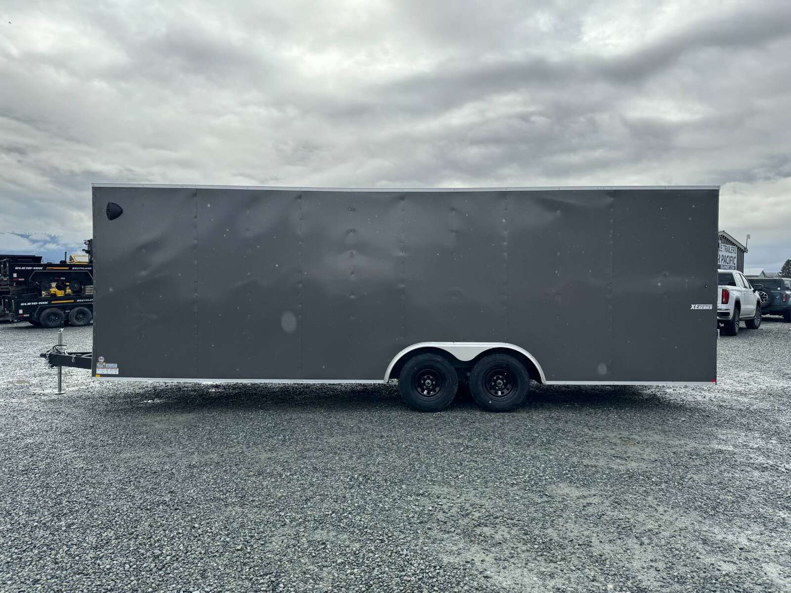 Photo of 2025 Mirage XE 8.5x24 V Nose Cargo / Enclosed Trailer Extra Height Ramp Door Charcoal Grey 9900lb GVW