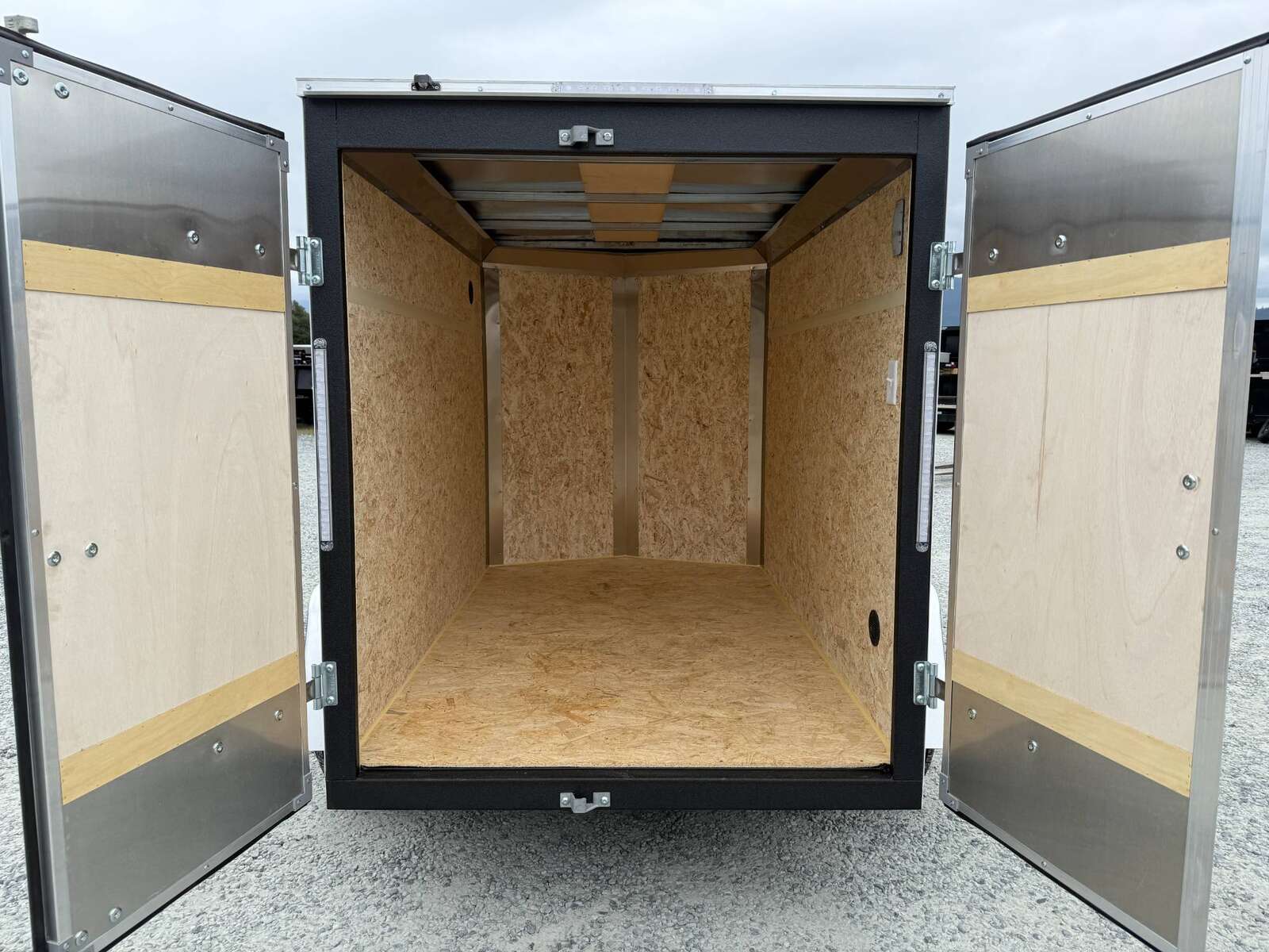 Photo of 2025 Mirage XE 5x8 V Nose Cargo / Enclosed Trailer White Barn Door 2990lb GVW