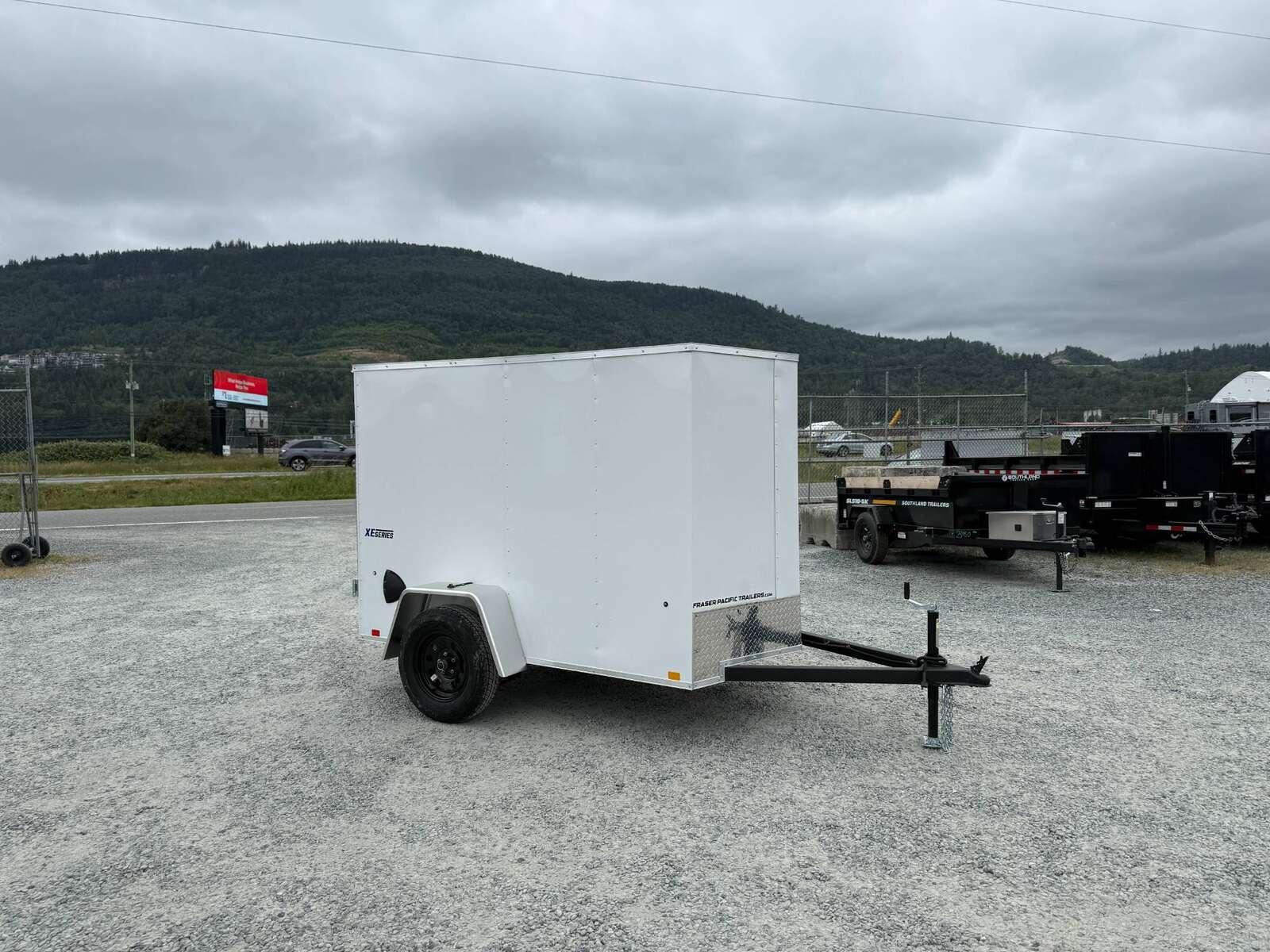 Photo of 2025 Mirage XE 5x8 V Nose Cargo / Enclosed Trailer White Barn Door 2990lb GVW