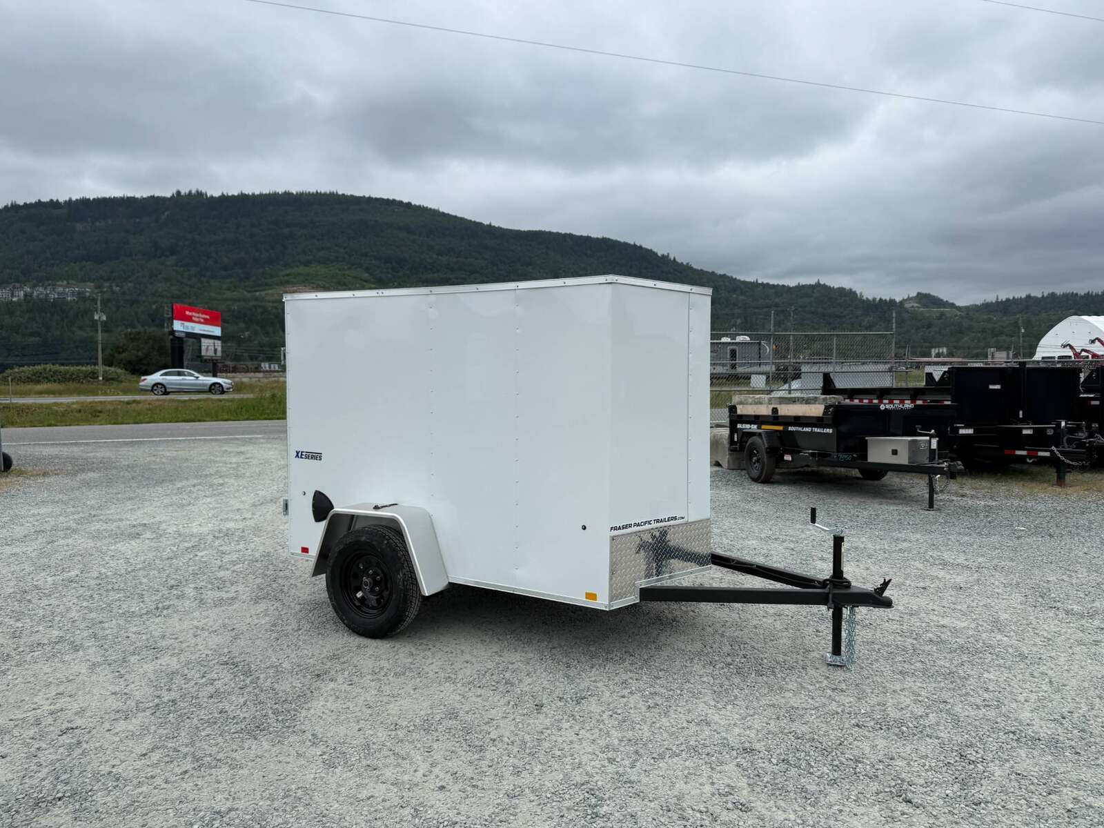 Photo of 2025 Mirage XE 5x8 V Nose Cargo / Enclosed Trailer White Barn Door 2990lb GVW