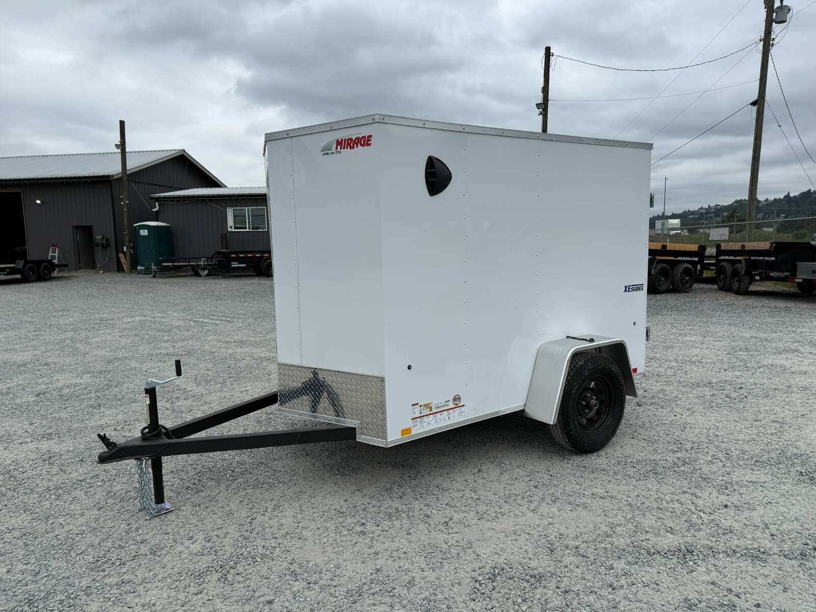 Photo of 2025 Mirage XE 5x8 V Nose Cargo / Enclosed Trailer White Barn Door 2990lb GVW