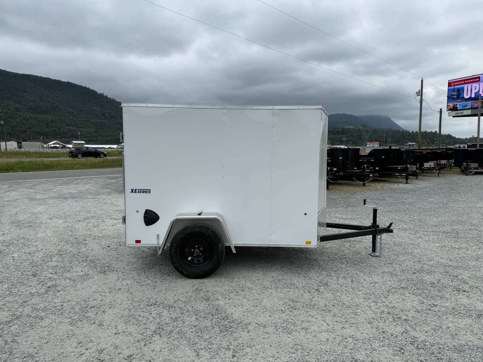 Photo of 2025 Mirage XE 5x8 V Nose Cargo / Enclosed Trailer White Barn Door 2990lb GVW